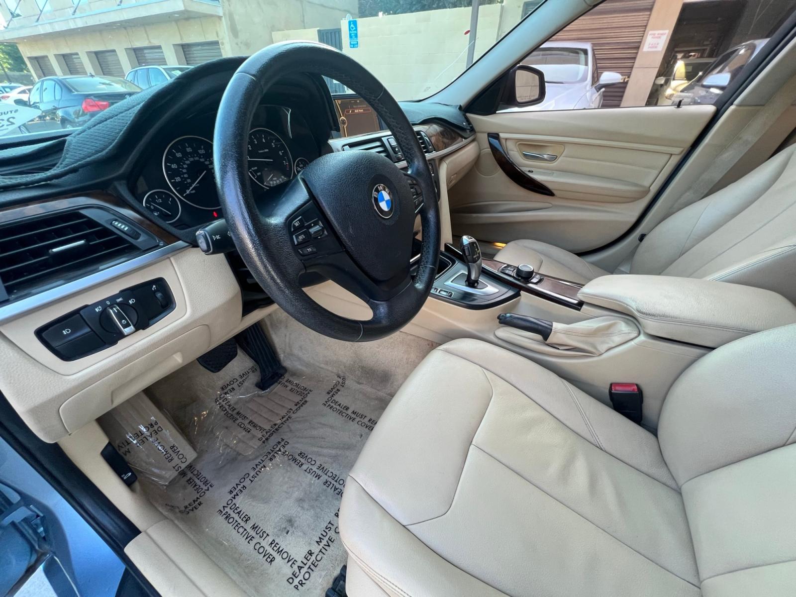 2014 BLUE /BEIGE BMW 3-Series 320i Sedan (WBA3B1G55EN) with an 2.0L L4 DOHC 16V engine, AUTOMATIC transmission, located at 30 S. Berkeley Avenue, Pasadena, CA, 91107, (626) 248-7567, 34.145447, -118.109398 - Crown City Motors is a used “Buy Here Pay Here” car dealer in Pasadena CA. “Buy Here Pay Here” financing, means that when you purchase your vehicle from our dealership, that you make the payments to the dealership as well. We do not need the banks approval to get you approved for a used auto - Photo #11