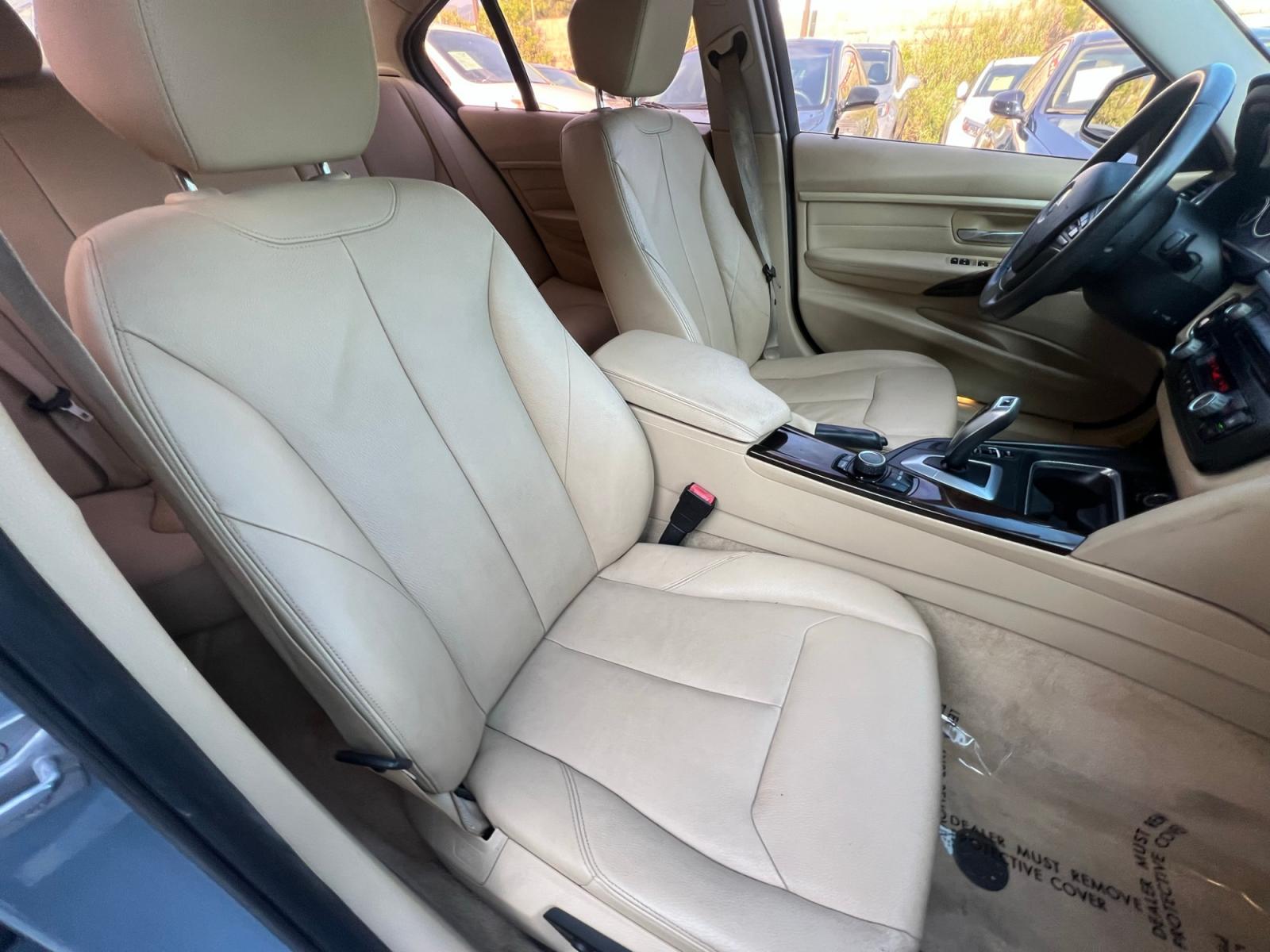 2014 BLUE /BEIGE BMW 3-Series 320i Sedan (WBA3B1G55EN) with an 2.0L L4 DOHC 16V engine, AUTOMATIC transmission, located at 30 S. Berkeley Avenue, Pasadena, CA, 91107, (626) 248-7567, 34.145447, -118.109398 - Crown City Motors is a used “Buy Here Pay Here” car dealer in Pasadena CA. “Buy Here Pay Here” financing, means that when you purchase your vehicle from our dealership, that you make the payments to the dealership as well. We do not need the banks approval to get you approved for a used auto - Photo #13