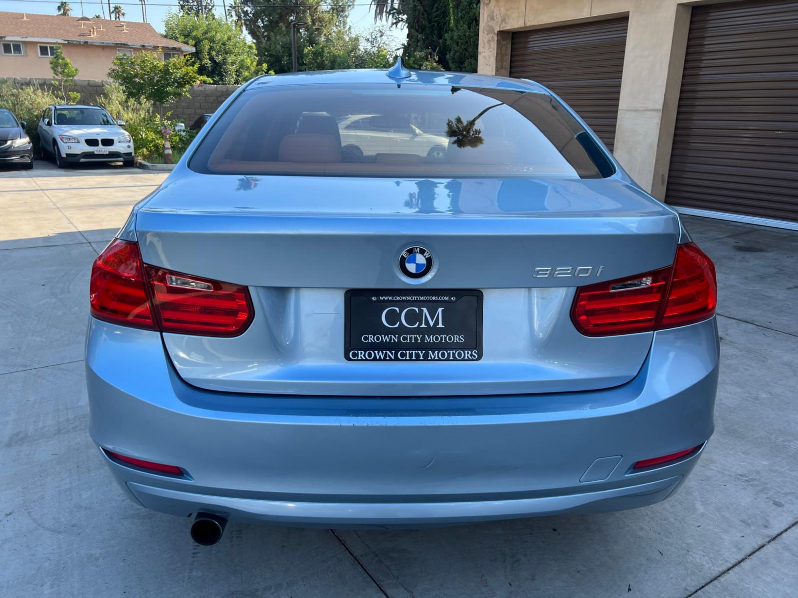 2014 BLUE /BEIGE BMW 3-Series 320i Sedan (WBA3B1G55EN) with an 2.0L L4 DOHC 16V engine, AUTOMATIC transmission, located at 30 S. Berkeley Avenue, Pasadena, CA, 91107, (626) 248-7567, 34.145447, -118.109398 - Crown City Motors is a used “Buy Here Pay Here” car dealer in Pasadena CA. “Buy Here Pay Here” financing, means that when you purchase your vehicle from our dealership, that you make the payments to the dealership as well. We do not need the banks approval to get you approved for a used auto - Photo #3