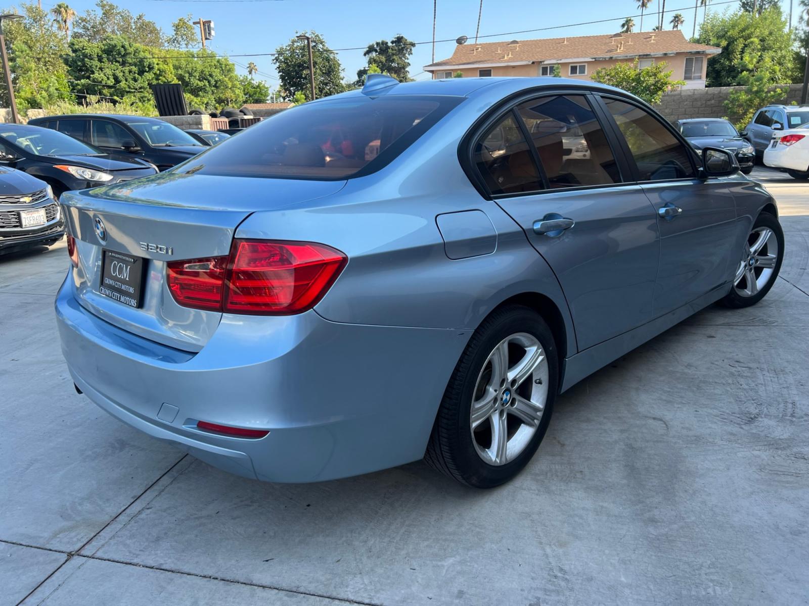 2014 BLUE /BEIGE BMW 3-Series 320i Sedan (WBA3B1G55EN) with an 2.0L L4 DOHC 16V engine, AUTOMATIC transmission, located at 30 S. Berkeley Avenue, Pasadena, CA, 91107, (626) 248-7567, 34.145447, -118.109398 - Crown City Motors is a used “Buy Here Pay Here” car dealer in Pasadena CA. “Buy Here Pay Here” financing, means that when you purchase your vehicle from our dealership, that you make the payments to the dealership as well. We do not need the banks approval to get you approved for a used auto - Photo #4