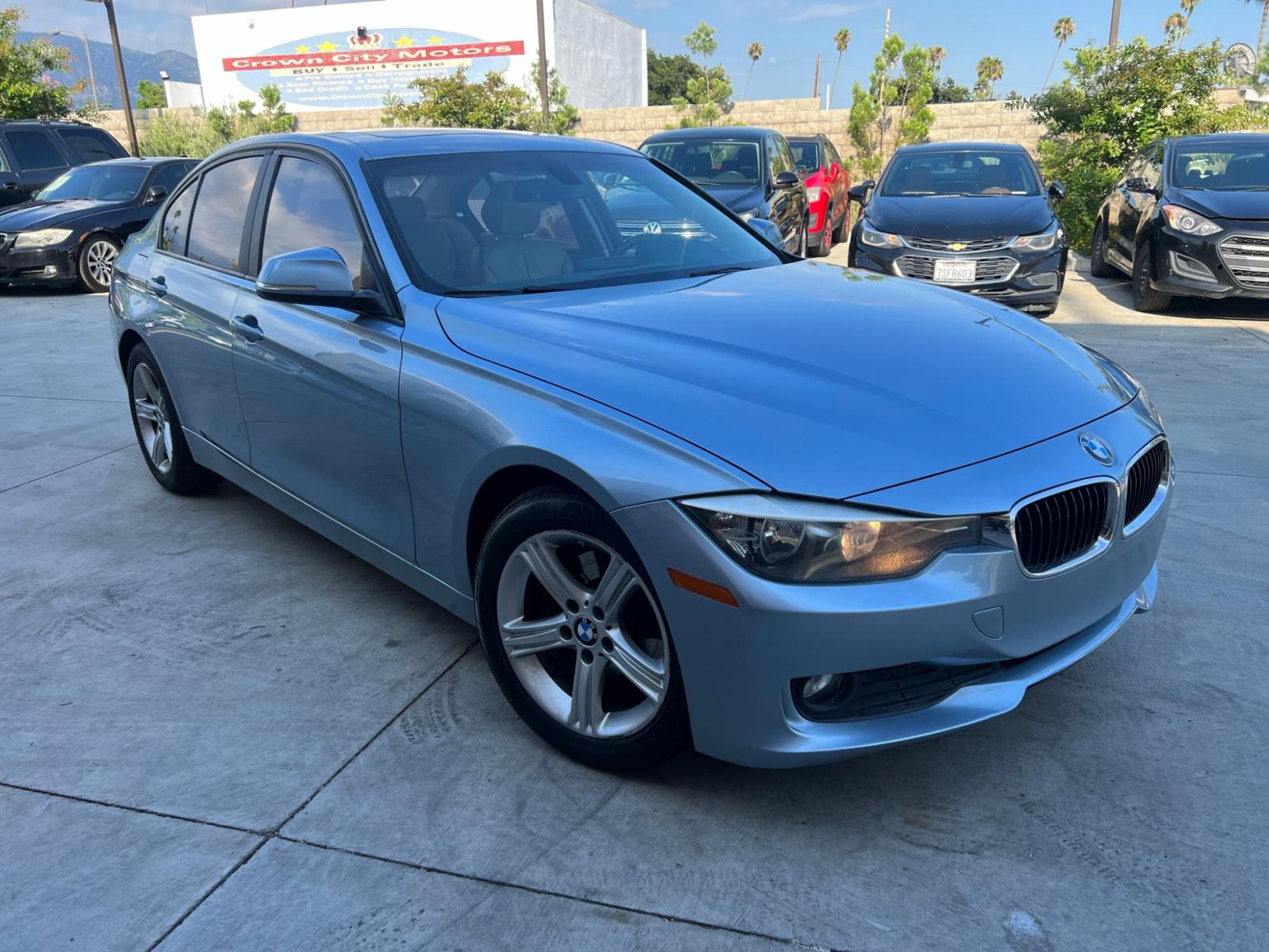 2014 BLUE /BEIGE BMW 3-Series 320i Sedan (WBA3B1G55EN) with an 2.0L L4 DOHC 16V engine, AUTOMATIC transmission, located at 30 S. Berkeley Avenue, Pasadena, CA, 91107, (626) 248-7567, 34.145447, -118.109398 - Crown City Motors is a used “Buy Here Pay Here” car dealer in Pasadena CA. “Buy Here Pay Here” financing, means that when you purchase your vehicle from our dealership, that you make the payments to the dealership as well. We do not need the banks approval to get you approved for a used auto - Photo #5