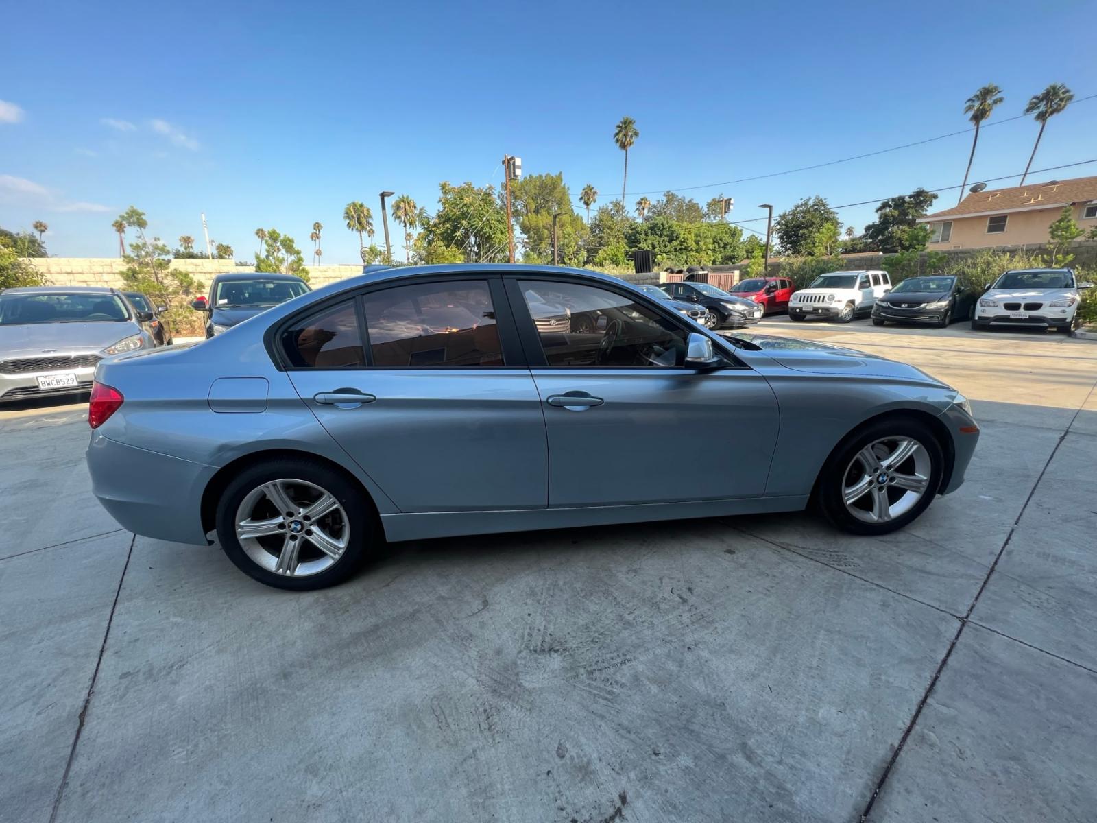 2014 BLUE /BEIGE BMW 3-Series 320i Sedan (WBA3B1G55EN) with an 2.0L L4 DOHC 16V engine, AUTOMATIC transmission, located at 30 S. Berkeley Avenue, Pasadena, CA, 91107, (626) 248-7567, 34.145447, -118.109398 - Crown City Motors is a used “Buy Here Pay Here” car dealer in Pasadena CA. “Buy Here Pay Here” financing, means that when you purchase your vehicle from our dealership, that you make the payments to the dealership as well. We do not need the banks approval to get you approved for a used auto - Photo #6