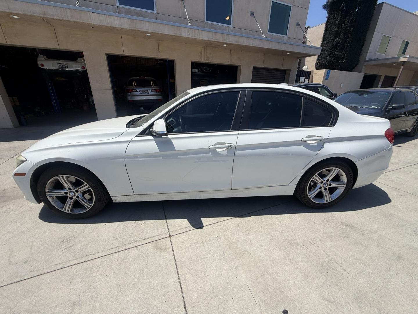 2013 White BMW 3-Series 328i Sedan (WBA3C1C52DF) with an 2.0L L4 DOHC 16V engine, AUTOMATIC transmission, located at 30 S. Berkeley Avenue, Pasadena, CA, 91107, (626) 248-7567, 34.145447, -118.109398 - Crown City Motors is a used “Buy Here Pay Here” car dealer in Pasadena CA. “Buy Here Pay Here” financing, means that when you purchase your vehicle from our dealership, that you make the payments to the dealership as well. We do not need the banks approval to get you approved for a used auto- Photo#1