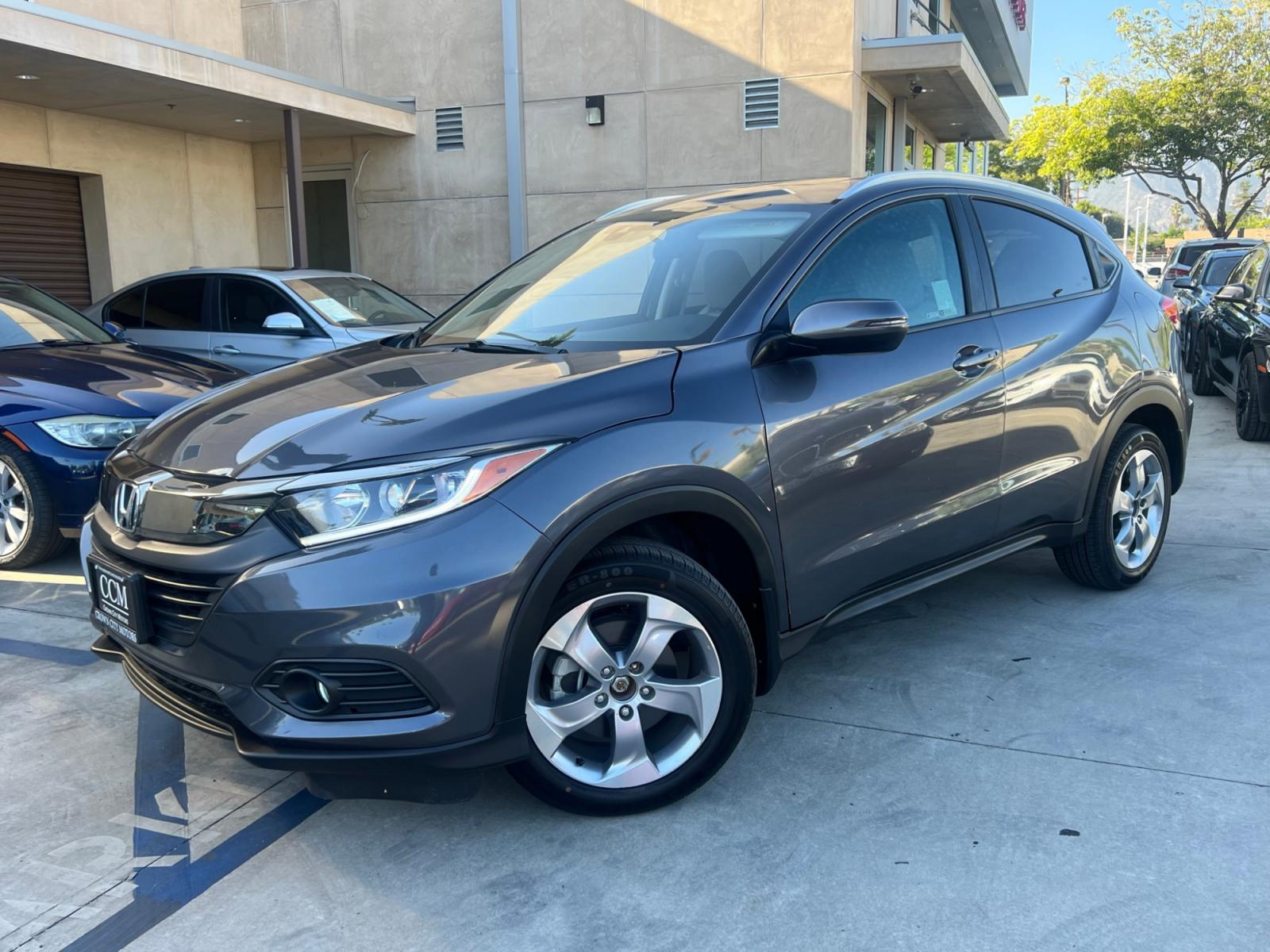 2019 Gray Honda HR-V EX (3CZRU5H51KM) with an 1.8L L4 DOHC 16V engine, CVT transmission, located at 30 S. Berkeley Avenue, Pasadena, CA, 91107, (626) 248-7567, 34.145447, -118.109398 - Crown City Motors is a used “Buy Here Pay Here” car dealer in Pasadena CA. “Buy Here Pay Here” financing, means that when you purchase your vehicle from our dealership, that you make the payments to the dealership as well. We do not need the banks approval to get you approved for a used auto - Photo #0