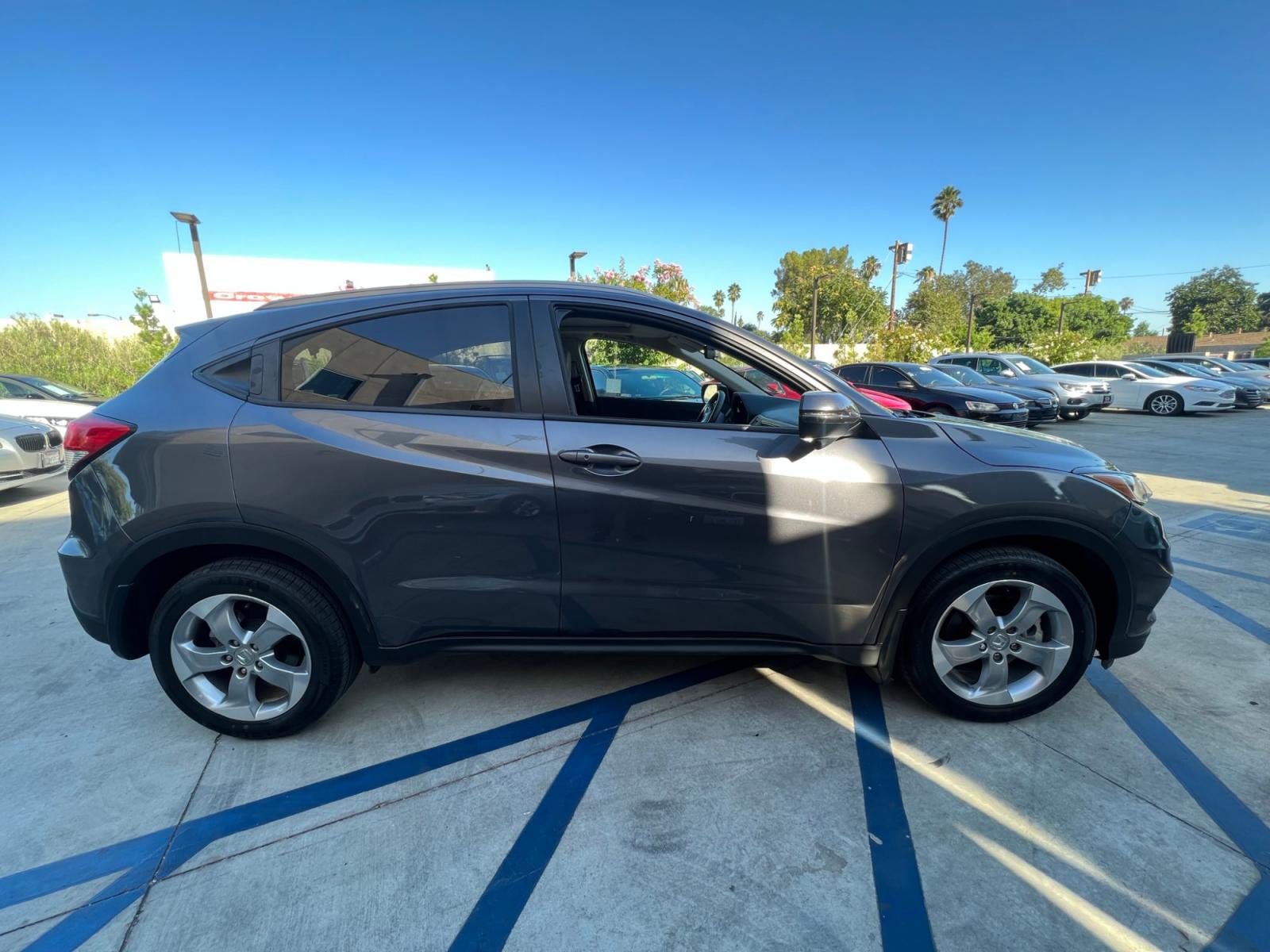 2019 Gray Honda HR-V EX (3CZRU5H51KM) with an 1.8L L4 DOHC 16V engine, CVT transmission, located at 30 S. Berkeley Avenue, Pasadena, CA, 91107, (626) 248-7567, 34.145447, -118.109398 - Crown City Motors is a used “Buy Here Pay Here” car dealer in Pasadena CA. “Buy Here Pay Here” financing, means that when you purchase your vehicle from our dealership, that you make the payments to the dealership as well. We do not need the banks approval to get you approved for a used auto - Photo #5