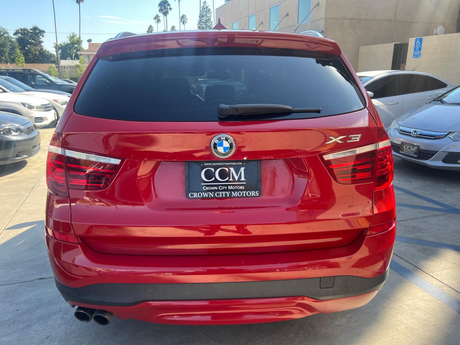 2016 RED /Tan BMW X3 xDrive28i (5UXWX9C50G0) with an 2.0L L4 DOHC 16V engine, 8-Speed Automatic transmission, located at 30 S. Berkeley Avenue, Pasadena, CA, 91107, (626) 248-7567, 34.145447, -118.109398 - Crown City Motors is a used “Buy Here Pay Here” car dealer in Pasadena CA. “Buy Here Pay Here” financing, means that when you purchase your vehicle from our dealership, that you make the payments to the dealership as well. We do not need the banks approval to get you approved for a used auto - Photo #3