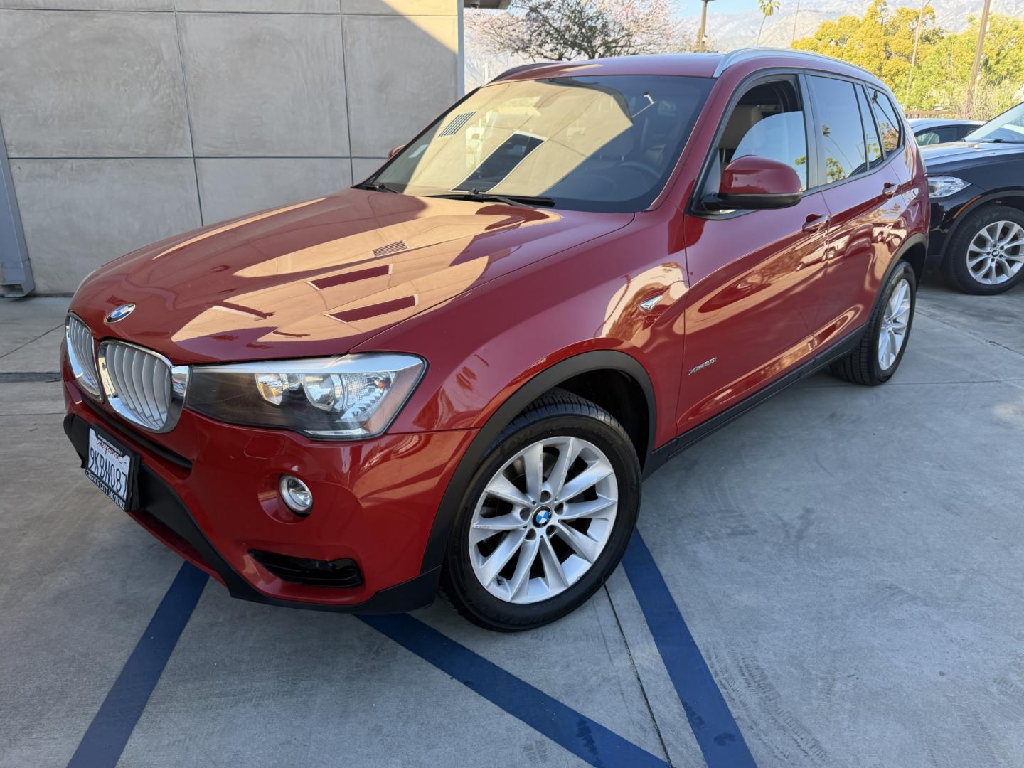 2016 RED /Tan BMW X3 xDrive28i (5UXWX9C50G0) with an 2.0L L4 DOHC 16V engine, 8-Speed Automatic transmission, located at 30 S. Berkeley Avenue, Pasadena, CA, 91107, (626) 248-7567, 34.145447, -118.109398 - Crown City Motors is a used “Buy Here Pay Here” car dealer in Pasadena CA. “Buy Here Pay Here” financing, means that when you purchase your vehicle from our dealership, that you make the payments to the dealership as well. We do not need the banks approval to get you approved for a used auto - Photo#5