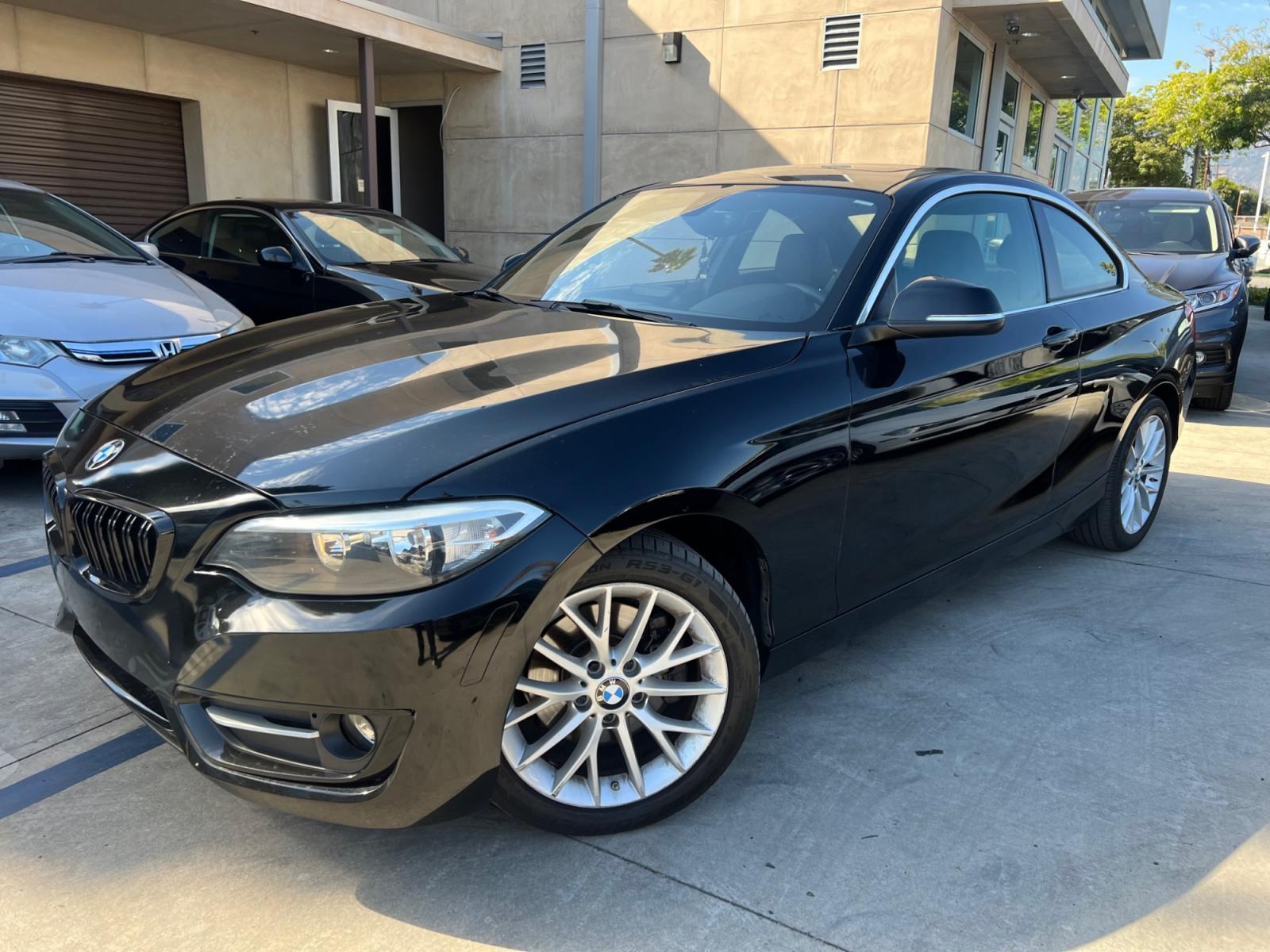 2016 Black BMW 2-Series 228i SULEV Coupe (WBA1F9C51GV) with an 2.0L L4 DOHC 16V engine, 8A transmission, located at 30 S. Berkeley Avenue, Pasadena, CA, 91107, (626) 248-7567, 34.145447, -118.109398 - Crown City Motors is a used “Buy Here Pay Here” car dealer in Pasadena CA. “Buy Here Pay Here” financing, means that when you purchase your vehicle from our dealership, that you make the payments to the dealership as well. We do not need the banks approval to get you approved for a used auto - Photo #0