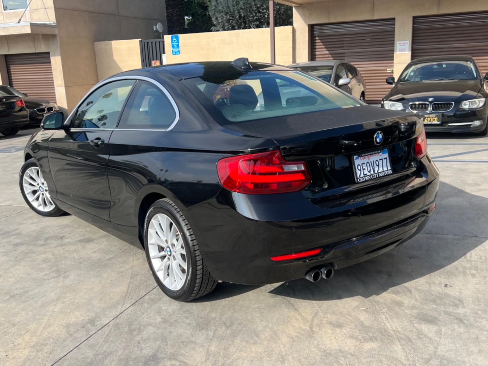 2016 Black BMW 2-Series 228i SULEV Coupe (WBA1F9C51GV) with an 2.0L L4 DOHC 16V engine, 8A transmission, located at 30 S. Berkeley Avenue, Pasadena, CA, 91107, (626) 248-7567, 34.145447, -118.109398 - Crown City Motors is a used “Buy Here Pay Here” car dealer in Pasadena CA. “Buy Here Pay Here” financing, means that when you purchase your vehicle from our dealership, that you make the payments to the dealership as well. We do not need the banks approval to get you approved for a used auto - Photo #2