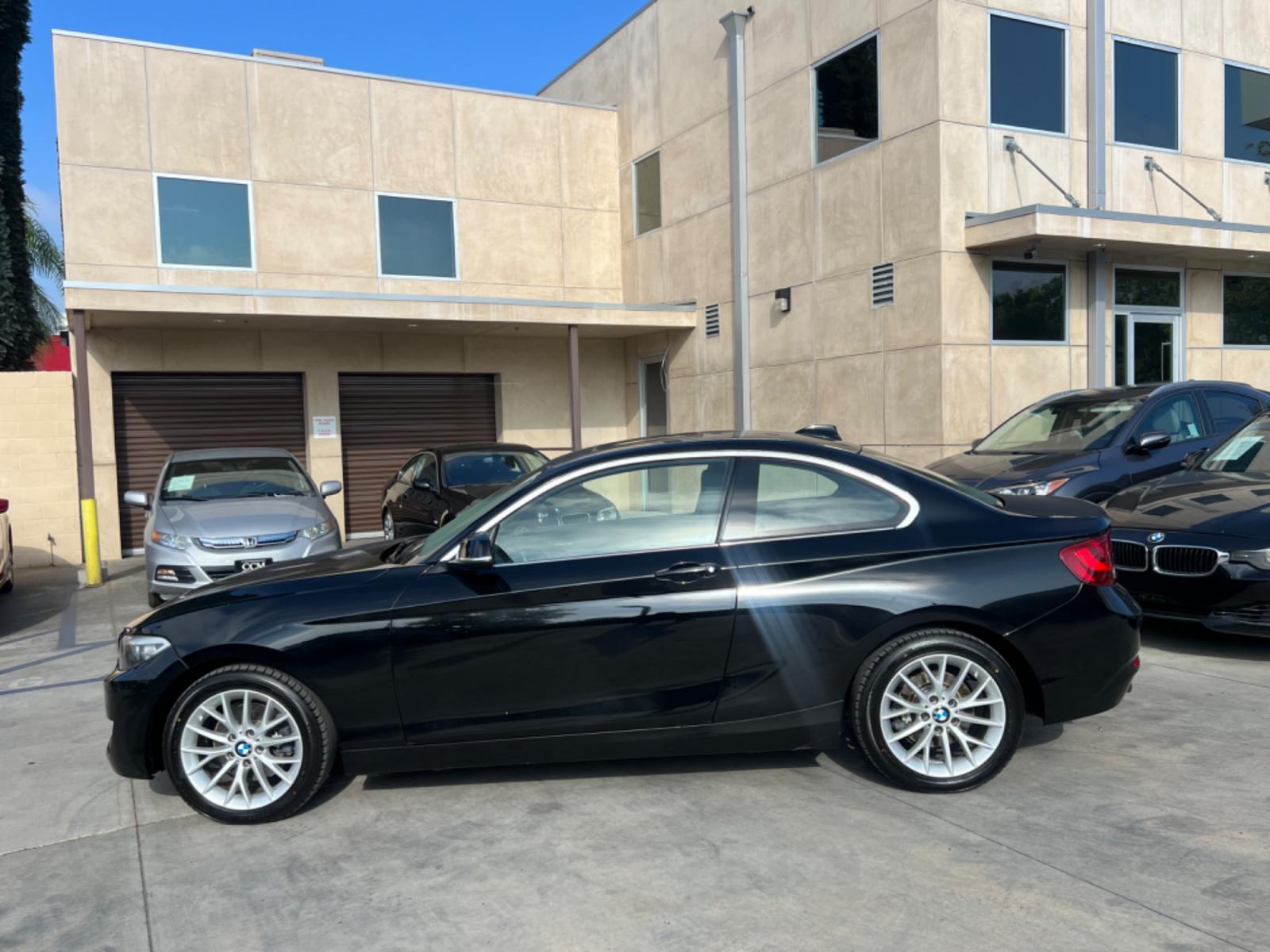 2016 Black BMW 2-Series 228i SULEV Coupe (WBA1F9C51GV) with an 2.0L L4 DOHC 16V engine, 8A transmission, located at 30 S. Berkeley Avenue, Pasadena, CA, 91107, (626) 248-7567, 34.145447, -118.109398 - Crown City Motors is a used “Buy Here Pay Here” car dealer in Pasadena CA. “Buy Here Pay Here” financing, means that when you purchase your vehicle from our dealership, that you make the payments to the dealership as well. We do not need the banks approval to get you approved for a used auto - Photo #3