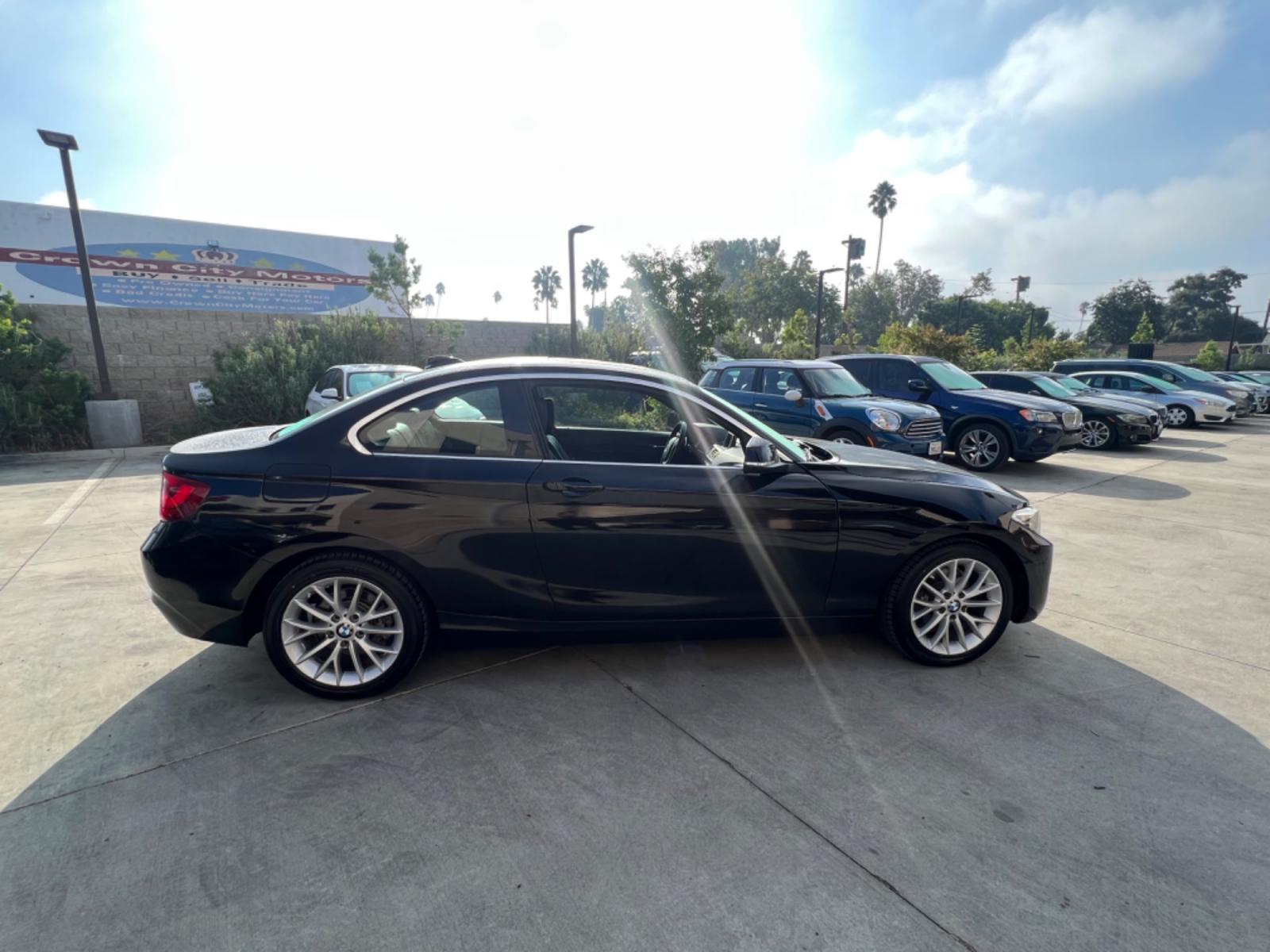 2016 Black BMW 2-Series 228i SULEV Coupe (WBA1F9C51GV) with an 2.0L L4 DOHC 16V engine, 8A transmission, located at 30 S. Berkeley Avenue, Pasadena, CA, 91107, (626) 248-7567, 34.145447, -118.109398 - Crown City Motors is a used “Buy Here Pay Here” car dealer in Pasadena CA. “Buy Here Pay Here” financing, means that when you purchase your vehicle from our dealership, that you make the payments to the dealership as well. We do not need the banks approval to get you approved for a used auto - Photo #6