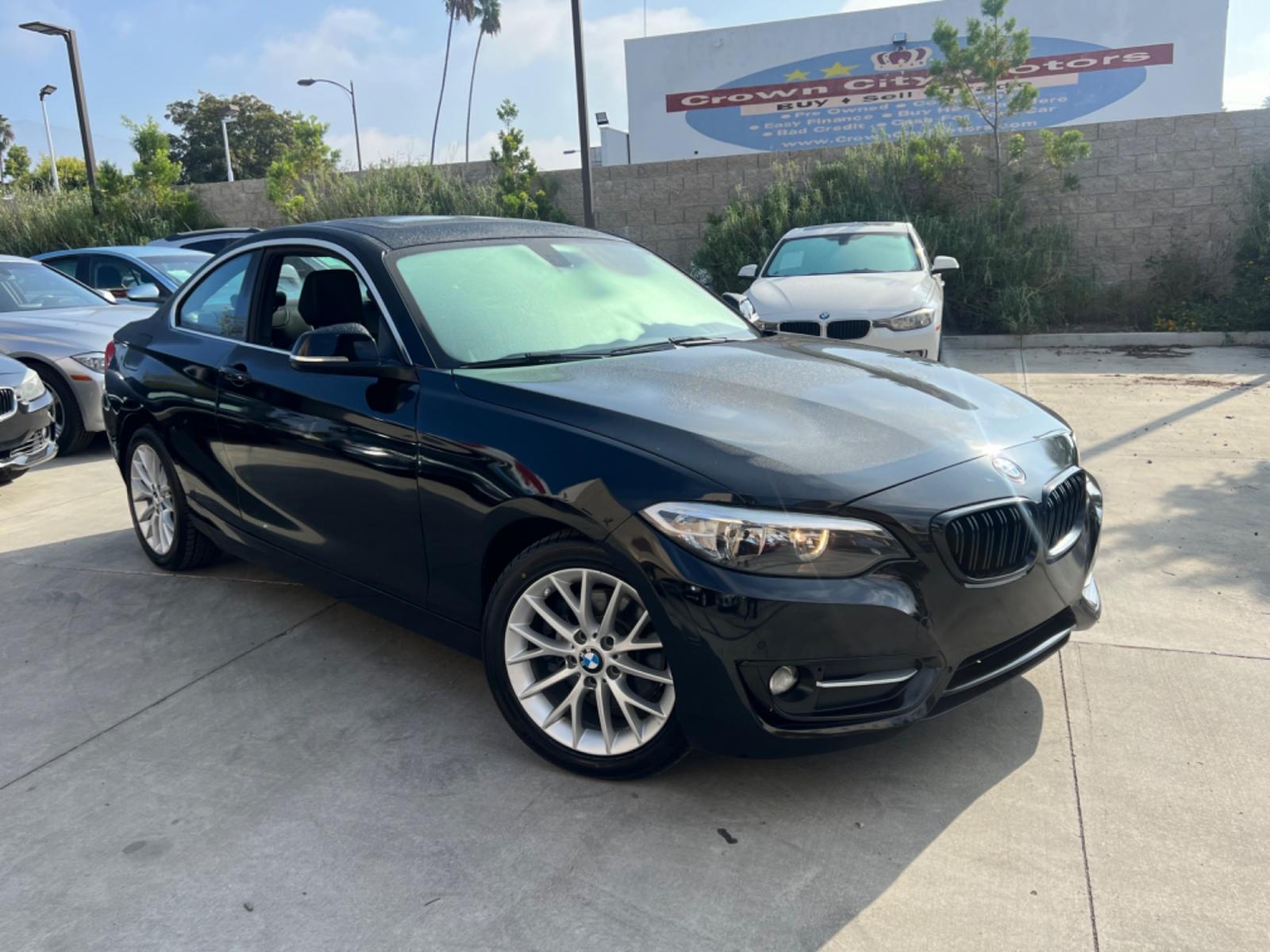 2016 Black BMW 2-Series 228i SULEV Coupe (WBA1F9C51GV) with an 2.0L L4 DOHC 16V engine, 8A transmission, located at 30 S. Berkeley Avenue, Pasadena, CA, 91107, (626) 248-7567, 34.145447, -118.109398 - Crown City Motors is a used “Buy Here Pay Here” car dealer in Pasadena CA. “Buy Here Pay Here” financing, means that when you purchase your vehicle from our dealership, that you make the payments to the dealership as well. We do not need the banks approval to get you approved for a used auto - Photo #7