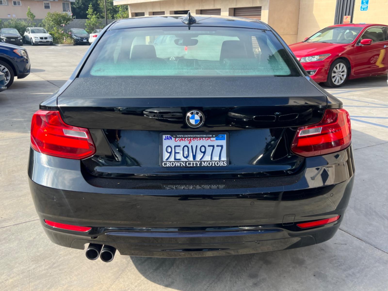 2016 Black BMW 2-Series 228i SULEV Coupe (WBA1F9C51GV) with an 2.0L L4 DOHC 16V engine, 8A transmission, located at 30 S. Berkeley Avenue, Pasadena, CA, 91107, (626) 248-7567, 34.145447, -118.109398 - Crown City Motors is a used “Buy Here Pay Here” car dealer in Pasadena CA. “Buy Here Pay Here” financing, means that when you purchase your vehicle from our dealership, that you make the payments to the dealership as well. We do not need the banks approval to get you approved for a used auto - Photo #8