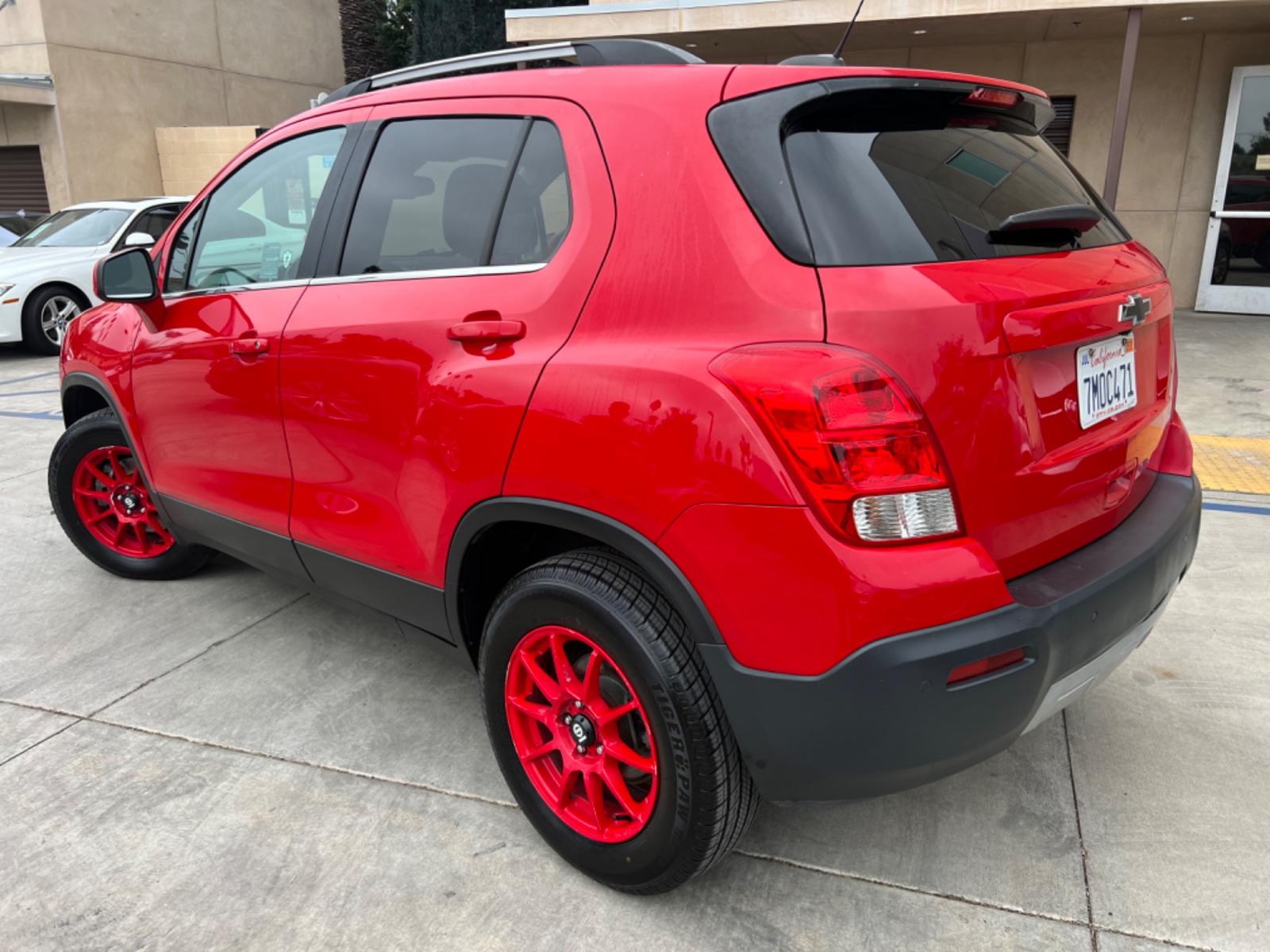 2015 RED /Black Chevrolet Trax LT AWD (KL7CJRSB2FB) with an 1.4L L4 DOHC 16V FFV engine, AUTOMATIC transmission, located at 30 S. Berkeley Avenue, Pasadena, CA, 91107, (626) 248-7567, 34.145447, -118.109398 - Crown City Motors is a used “Buy Here Pay Here” car dealer in Pasadena CA. “Buy Here Pay Here” financing, means that when you purchase your vehicle from our dealership, that you make the payments to the dealership as well. We do not need the banks approval to get you approved for a used auto - Photo #2