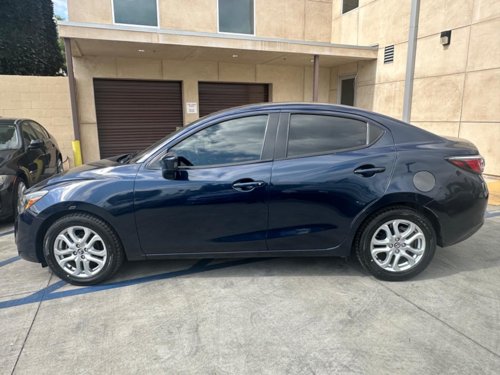 2017 BLUE /Black Scion Yaris iA 6M (3MYDLBYV9HY) with an 1.5L L4 DOHC 16V engine, Automatic transmission, located at 30 S. Berkeley Avenue, Pasadena, CA, 91107, (626) 248-7567, 34.145447, -118.109398 - New Tires! Low Miles! 2017 Scion Yaris iA - Drive with Confidence in Pasadena, CA On the hunt for top-notch BHPH cars in Pasadena, CA? Introducing the 2017 Scion Yaris iA. As a leading BHPH dealer in Los Angeles, CA, we are thrilled to feature this gem amongst our collection of pre-owned autos in - Photo #1
