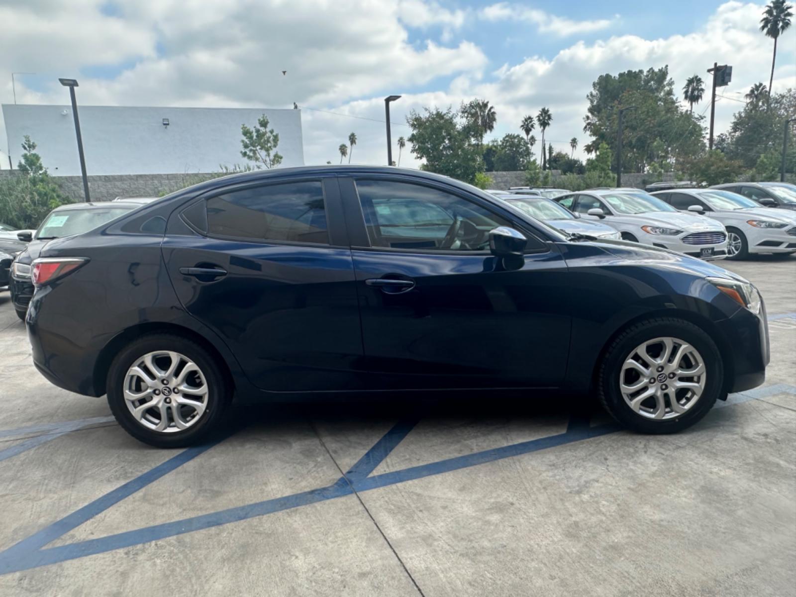 2017 BLUE /Black Scion Yaris iA 6M (3MYDLBYV9HY) with an 1.5L L4 DOHC 16V engine, Automatic transmission, located at 30 S. Berkeley Avenue, Pasadena, CA, 91107, (626) 248-7567, 34.145447, -118.109398 - New Tires! Low Miles! 2017 Scion Yaris iA - Drive with Confidence in Pasadena, CA On the hunt for top-notch BHPH cars in Pasadena, CA? Introducing the 2017 Scion Yaris iA. As a leading BHPH dealer in Los Angeles, CA, we are thrilled to feature this gem amongst our collection of pre-owned autos in - Photo #4