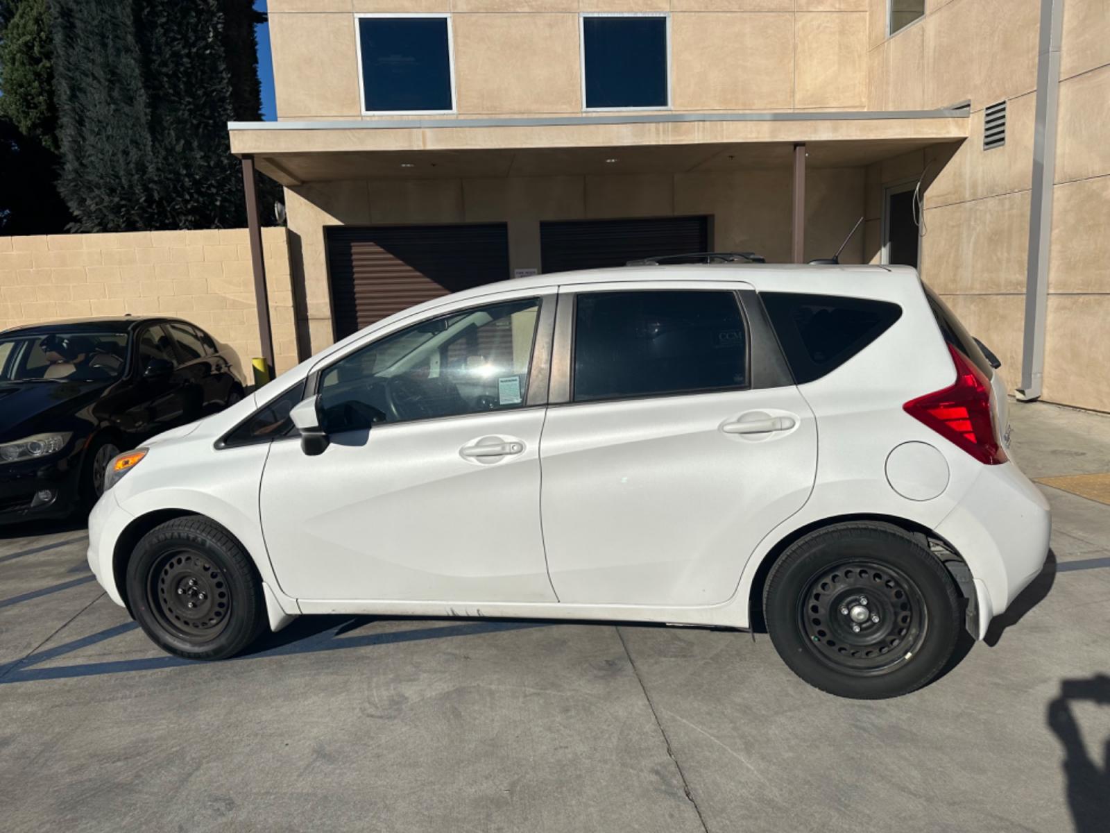 2016 White /Gray Nissan Versa Note S (3N1CE2CP8GL) with an 1.6L L4 DOHC 16V engine, autoamtic transmission, located at 30 S. Berkeley Avenue, Pasadena, CA, 91107, (626) 248-7567, 34.145447, -118.109398 - MPG! Good Value! The 2016 Nissan Versa Note Hatchback, a gem among pre-owned autos in Altadena, seamlessly blends efficiency, style, and practicality. For those navigating the bustling streets of Pasadena or the vast expanses of LA County, this hatchback promises a driving experience that's both ex - Photo #2