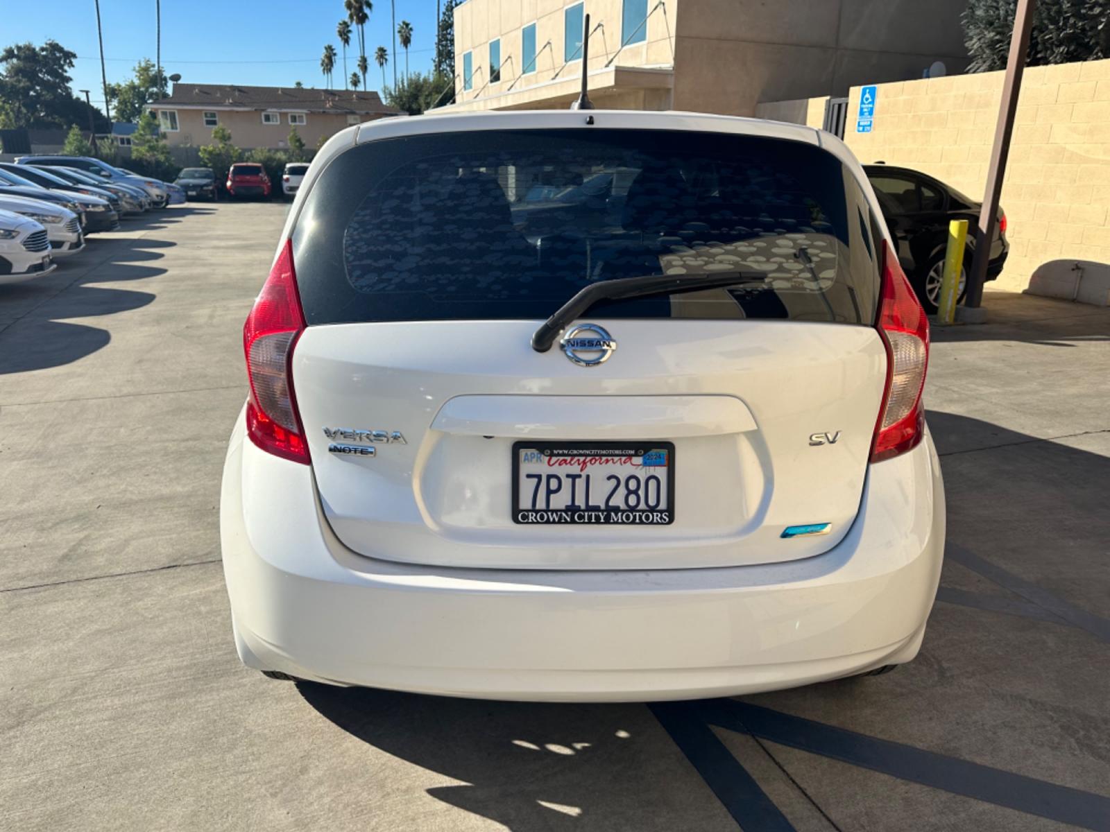 2016 White /Gray Nissan Versa Note S (3N1CE2CP8GL) with an 1.6L L4 DOHC 16V engine, autoamtic transmission, located at 30 S. Berkeley Avenue, Pasadena, CA, 91107, (626) 248-7567, 34.145447, -118.109398 - MPG! Good Value! The 2016 Nissan Versa Note Hatchback, a gem among pre-owned autos in Altadena, seamlessly blends efficiency, style, and practicality. For those navigating the bustling streets of Pasadena or the vast expanses of LA County, this hatchback promises a driving experience that's both ex - Photo #4