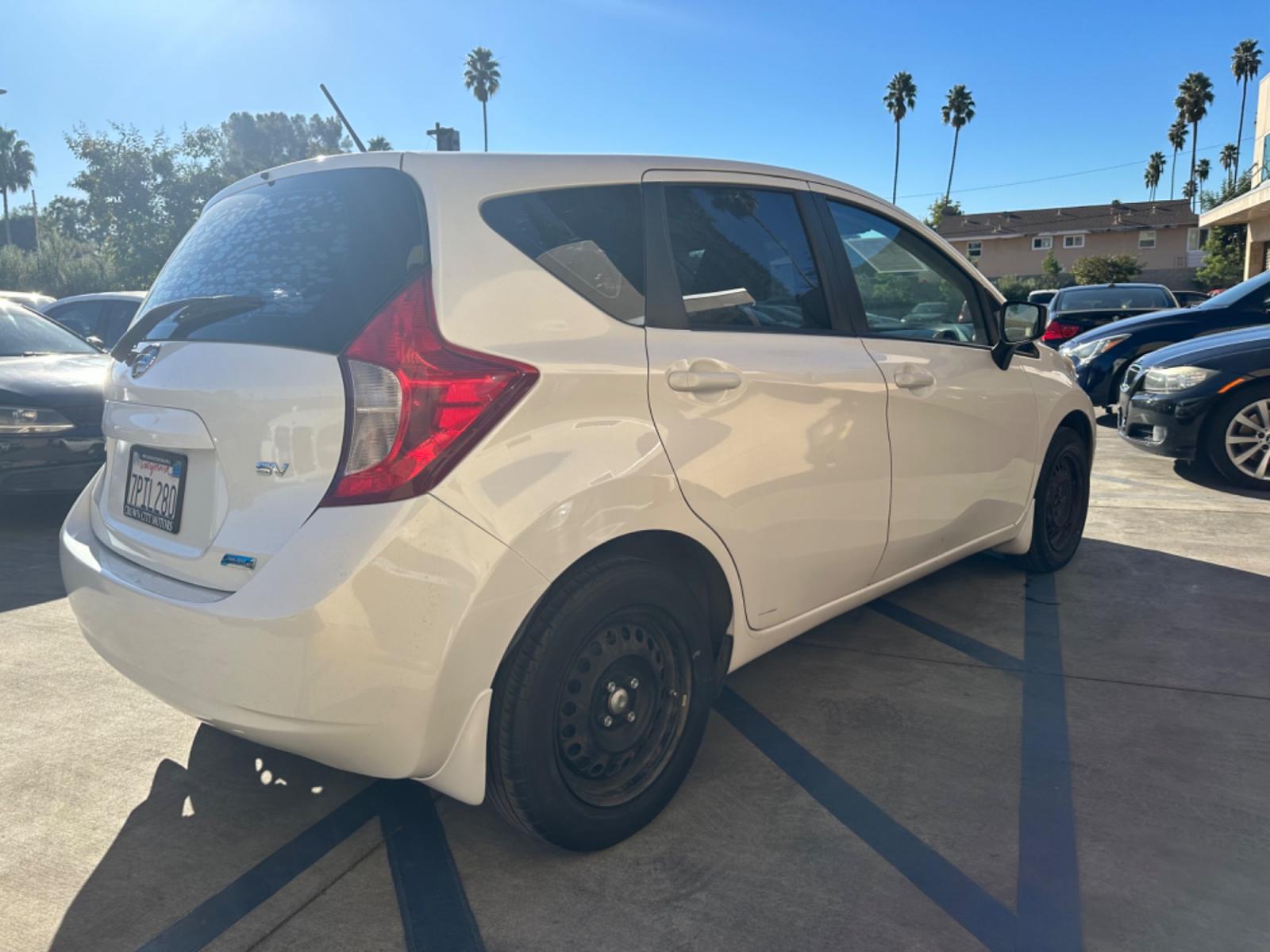 2016 White /Gray Nissan Versa Note S (3N1CE2CP8GL) with an 1.6L L4 DOHC 16V engine, autoamtic transmission, located at 30 S. Berkeley Avenue, Pasadena, CA, 91107, (626) 248-7567, 34.145447, -118.109398 - MPG! Good Value! The 2016 Nissan Versa Note Hatchback, a gem among pre-owned autos in Altadena, seamlessly blends efficiency, style, and practicality. For those navigating the bustling streets of Pasadena or the vast expanses of LA County, this hatchback promises a driving experience that's both ex - Photo #5