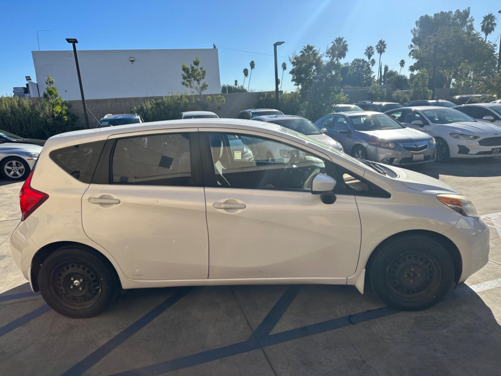 2016 White /Gray Nissan Versa Note S (3N1CE2CP8GL) with an 1.6L L4 DOHC 16V engine, autoamtic transmission, located at 30 S. Berkeley Avenue, Pasadena, CA, 91107, (626) 248-7567, 34.145447, -118.109398 - MPG! Good Value! The 2016 Nissan Versa Note Hatchback, a gem among pre-owned autos in Altadena, seamlessly blends efficiency, style, and practicality. For those navigating the bustling streets of Pasadena or the vast expanses of LA County, this hatchback promises a driving experience that's both ex - Photo #6
