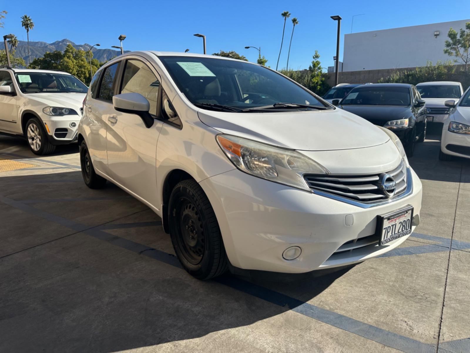 2016 White /Gray Nissan Versa Note S (3N1CE2CP8GL) with an 1.6L L4 DOHC 16V engine, autoamtic transmission, located at 30 S. Berkeley Avenue, Pasadena, CA, 91107, (626) 248-7567, 34.145447, -118.109398 - MPG! Good Value! The 2016 Nissan Versa Note Hatchback, a gem among pre-owned autos in Altadena, seamlessly blends efficiency, style, and practicality. For those navigating the bustling streets of Pasadena or the vast expanses of LA County, this hatchback promises a driving experience that's both ex - Photo #7