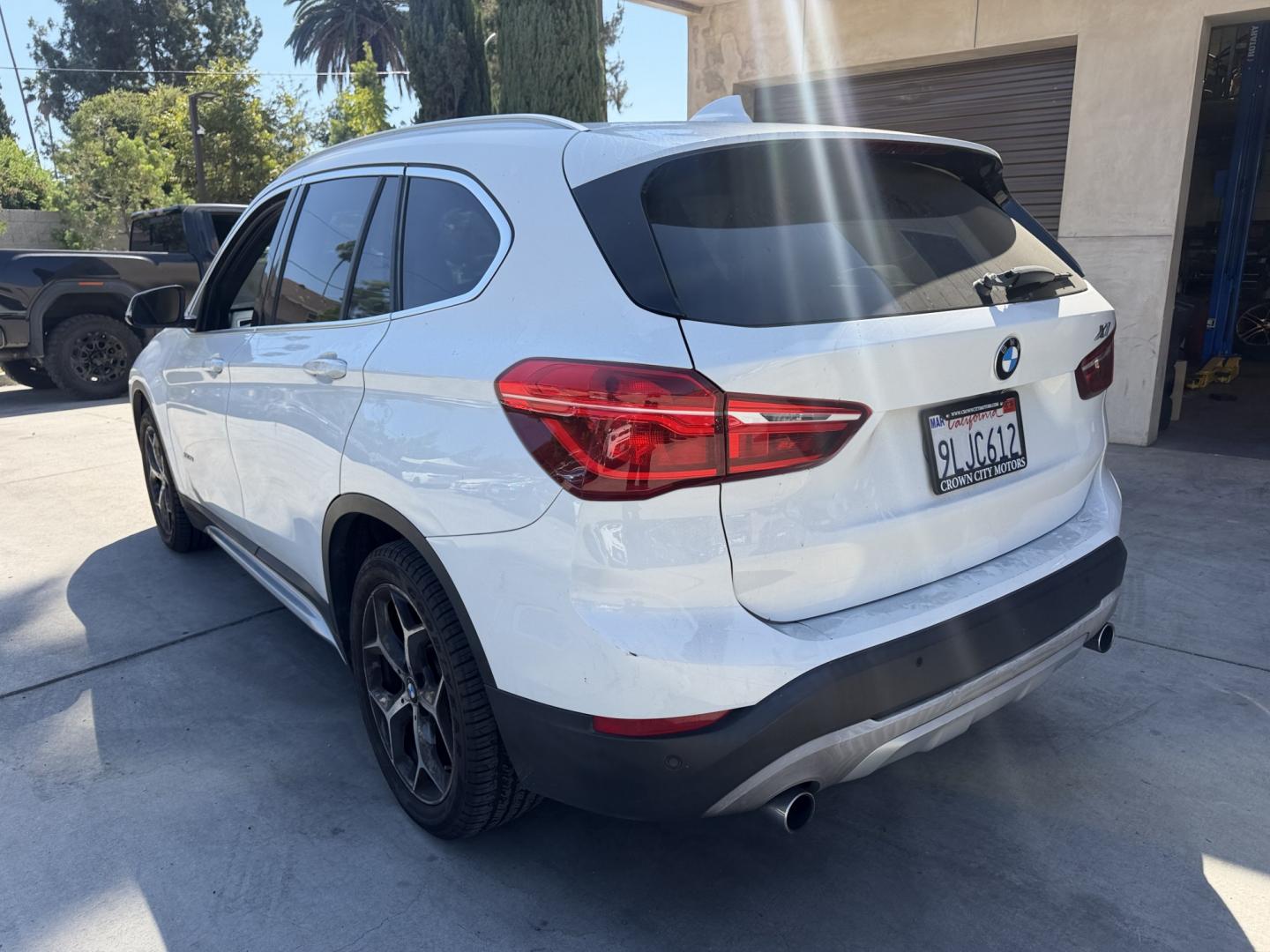 2017 WHITE /Tan BMW X1 (WBXHT3C31H5) with an 4 CYLINDER engine, Automatic transmission, located at 30 S. Berkeley Avenue, Pasadena, CA, 91107, (626) 248-7567, 34.145447, -118.109398 - Unleash Elegance and Performance: 2017 BMW X1 with Panoramic Roof and Sport Display - Your Premier Choice in Pasadena, CA Step into the realm of luxury with the 2017 BMW X1, an epitome of sophistication and performance. This exceptional SUV, featuring a panoramic roof, sport display, premium leat- Photo#1