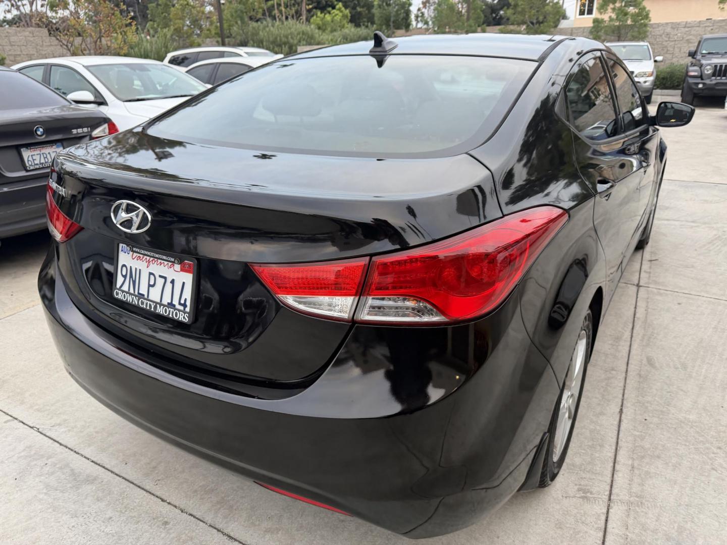 2013 Black /Black Hyundai Elantra (KMHDH4AE8DU) with an 4 Cylinder engine, Automatic transmission, located at 30 S. Berkeley Avenue, Pasadena, CA, 91107, (626) 248-7567, 34.145447, -118.109398 - Crown City Motors is a used “Buy Here Pay Here” car dealer in Pasadena CA. “Buy Here Pay Here” financing, means that when you purchase your vehicle from our dealership, that you make the payments to the dealership as well. We do not need the banks approval to get you approved for a used auto - Photo#2