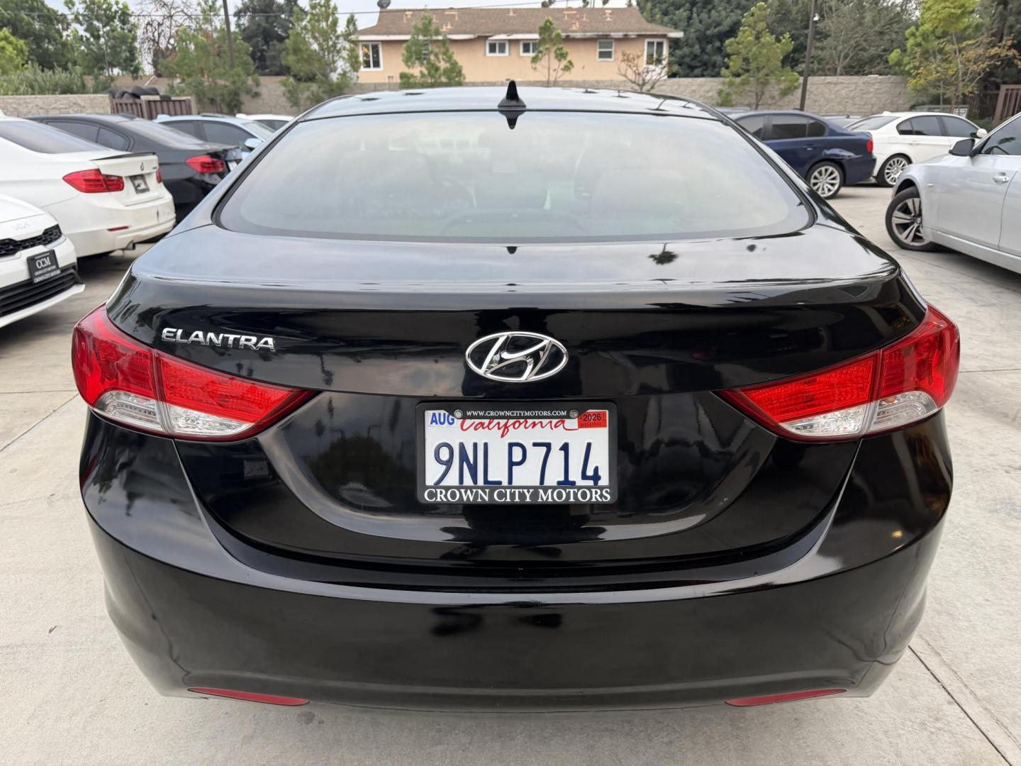 2013 Black /Black Hyundai Elantra (KMHDH4AE8DU) with an 4 Cylinder engine, Automatic transmission, located at 30 S. Berkeley Avenue, Pasadena, CA, 91107, (626) 248-7567, 34.145447, -118.109398 - Crown City Motors is a used “Buy Here Pay Here” car dealer in Pasadena CA. “Buy Here Pay Here” financing, means that when you purchase your vehicle from our dealership, that you make the payments to the dealership as well. We do not need the banks approval to get you approved for a used auto - Photo#3
