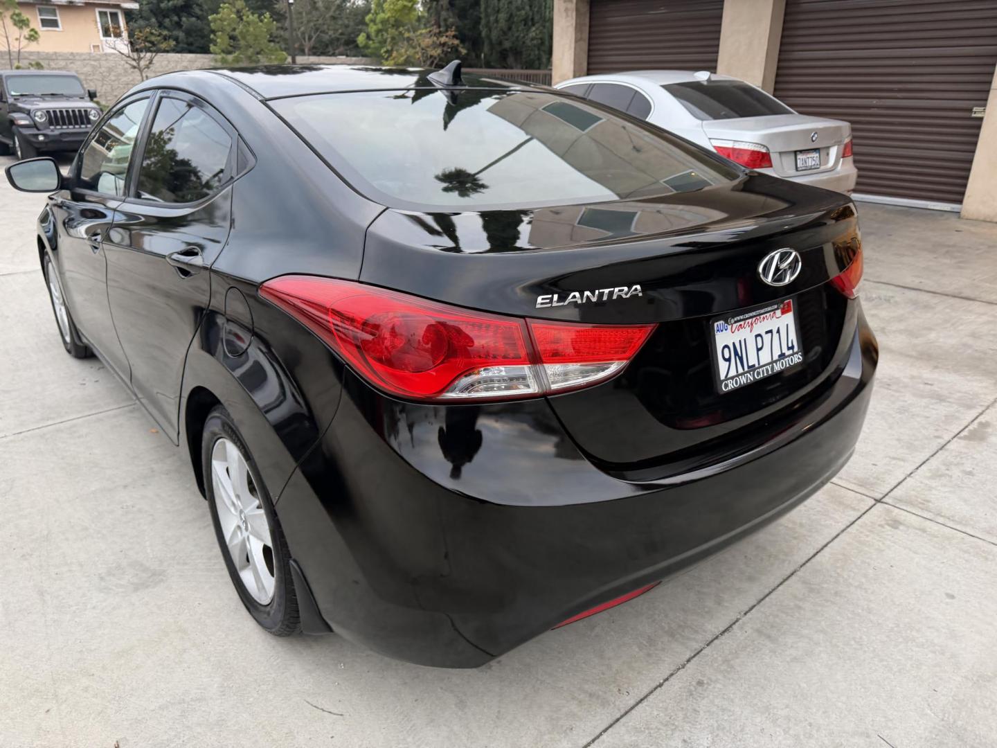 2013 Black /Black Hyundai Elantra (KMHDH4AE8DU) with an 4 Cylinder engine, Automatic transmission, located at 30 S. Berkeley Avenue, Pasadena, CA, 91107, (626) 248-7567, 34.145447, -118.109398 - Crown City Motors is a used “Buy Here Pay Here” car dealer in Pasadena CA. “Buy Here Pay Here” financing, means that when you purchase your vehicle from our dealership, that you make the payments to the dealership as well. We do not need the banks approval to get you approved for a used auto - Photo#4