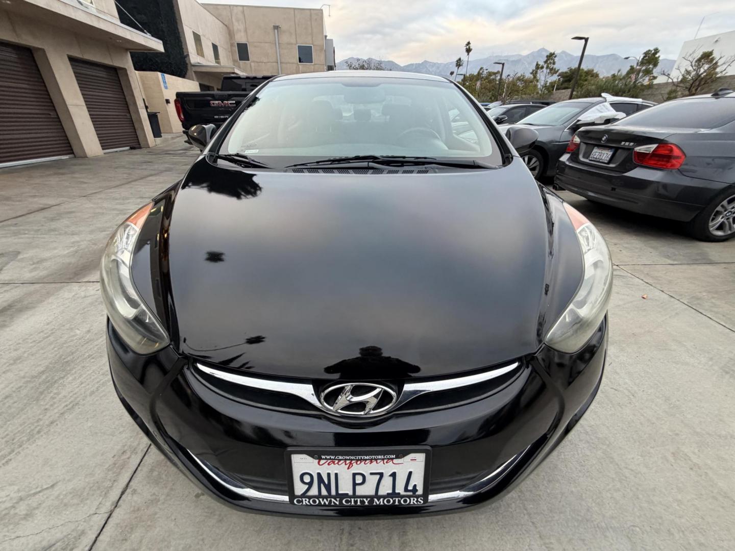 2013 Black /Black Hyundai Elantra (KMHDH4AE8DU) with an 4 Cylinder engine, Automatic transmission, located at 30 S. Berkeley Avenue, Pasadena, CA, 91107, (626) 248-7567, 34.145447, -118.109398 - Crown City Motors is a used “Buy Here Pay Here” car dealer in Pasadena CA. “Buy Here Pay Here” financing, means that when you purchase your vehicle from our dealership, that you make the payments to the dealership as well. We do not need the banks approval to get you approved for a used auto - Photo#5