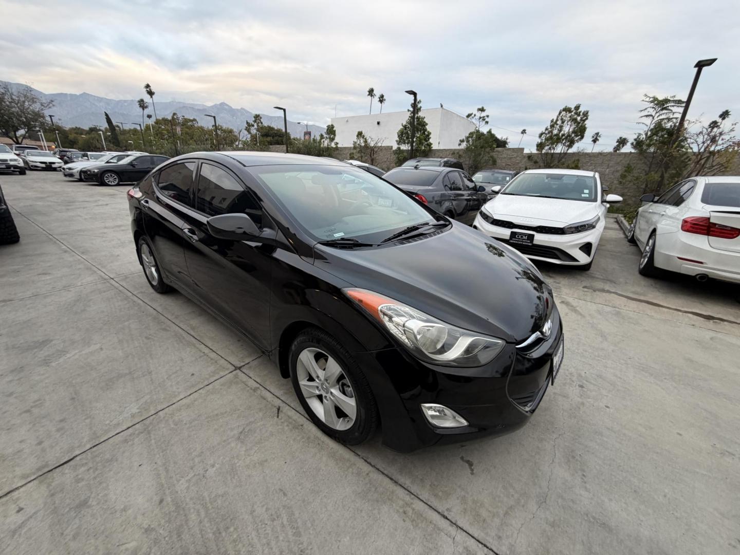 2013 Black /Black Hyundai Elantra (KMHDH4AE8DU) with an 4 Cylinder engine, Automatic transmission, located at 30 S. Berkeley Avenue, Pasadena, CA, 91107, (626) 248-7567, 34.145447, -118.109398 - Crown City Motors is a used “Buy Here Pay Here” car dealer in Pasadena CA. “Buy Here Pay Here” financing, means that when you purchase your vehicle from our dealership, that you make the payments to the dealership as well. We do not need the banks approval to get you approved for a used auto - Photo#6