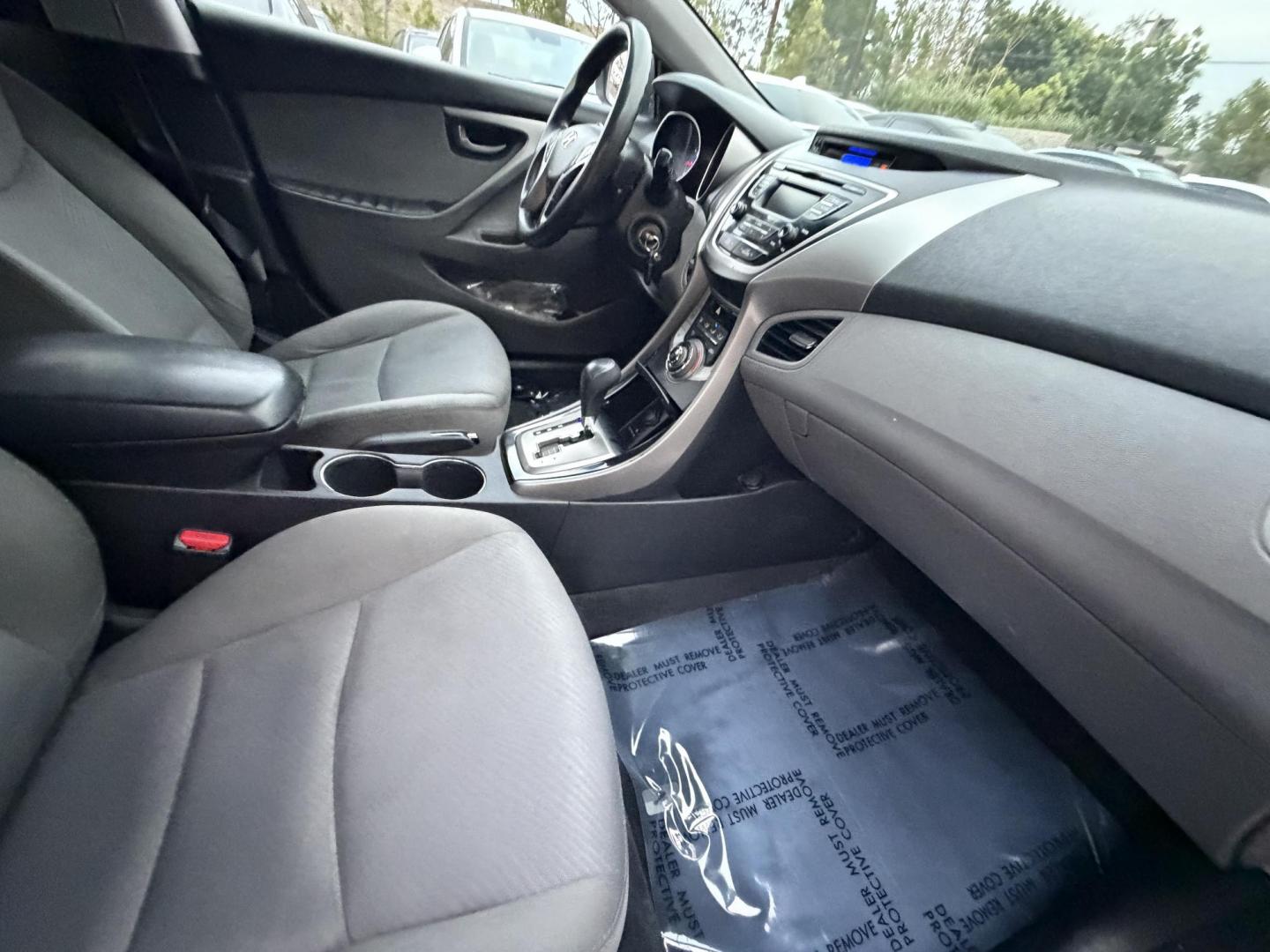 2013 Black /Black Hyundai Elantra (KMHDH4AE8DU) with an 4 Cylinder engine, Automatic transmission, located at 30 S. Berkeley Avenue, Pasadena, CA, 91107, (626) 248-7567, 34.145447, -118.109398 - Crown City Motors is a used “Buy Here Pay Here” car dealer in Pasadena CA. “Buy Here Pay Here” financing, means that when you purchase your vehicle from our dealership, that you make the payments to the dealership as well. We do not need the banks approval to get you approved for a used auto - Photo#12