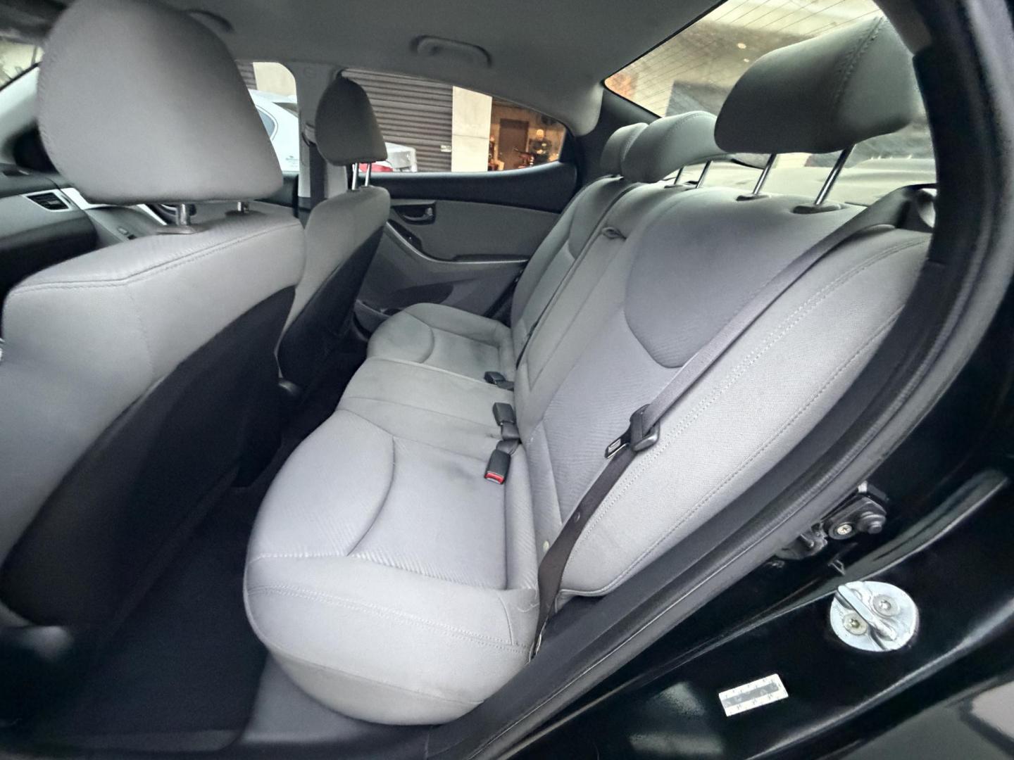 2013 Black /Black Hyundai Elantra (KMHDH4AE8DU) with an 4 Cylinder engine, Automatic transmission, located at 30 S. Berkeley Avenue, Pasadena, CA, 91107, (626) 248-7567, 34.145447, -118.109398 - Crown City Motors is a used “Buy Here Pay Here” car dealer in Pasadena CA. “Buy Here Pay Here” financing, means that when you purchase your vehicle from our dealership, that you make the payments to the dealership as well. We do not need the banks approval to get you approved for a used auto - Photo#9