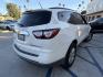2014 WHITE /Gray Chevrolet Traverse 1LT FWD (1GNKRGKD3EJ) with an 3.6L V6 DOHC 24V engine, 6-Speed Automatic transmission, located at 30 S. Berkeley Avenue, Pasadena, CA, 91107, (626) 248-7567, 34.145447, -118.109398 - Crown City Motors is a used “Buy Here Pay Here” car dealer in Pasadena CA. “Buy Here Pay Here” financing, means that when you purchase your vehicle from our dealership, that you make the payments to the dealership as well. We do not need the banks approval to get you approved for a used auto - Photo#4
