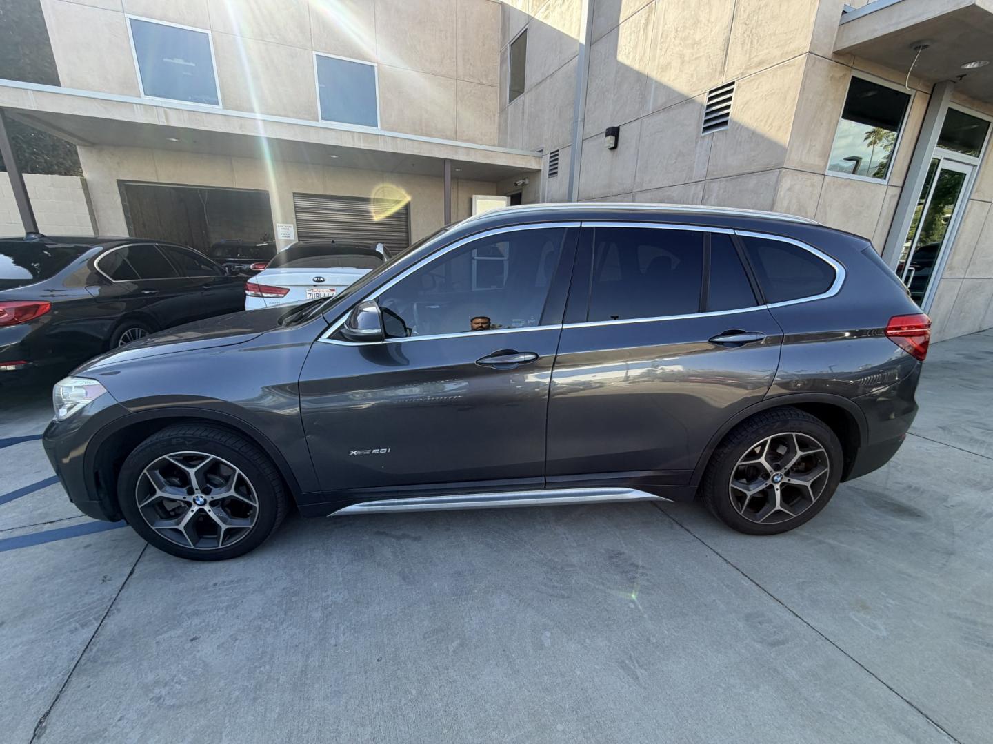 2016 Gray /Black BMW X1 leather (WBXHT3Z34G4) with an 4 CYLINDER engine, Automatic transmission, located at 30 S. Berkeley Avenue, Pasadena, CA, 91107, (626) 248-7567, 34.145447, -118.109398 - Looking for a reliable, stylish, and fuel-efficient luxury vehicle with easy financing in Pasadena, CA? This 2016 BMW X1 (VIN: WBXHT3Z34G4A48750) is the perfect combination of performance, comfort, and practicality—available now at Crown City Motors with Buy Here Pay Here financing designed for al - Photo#1
