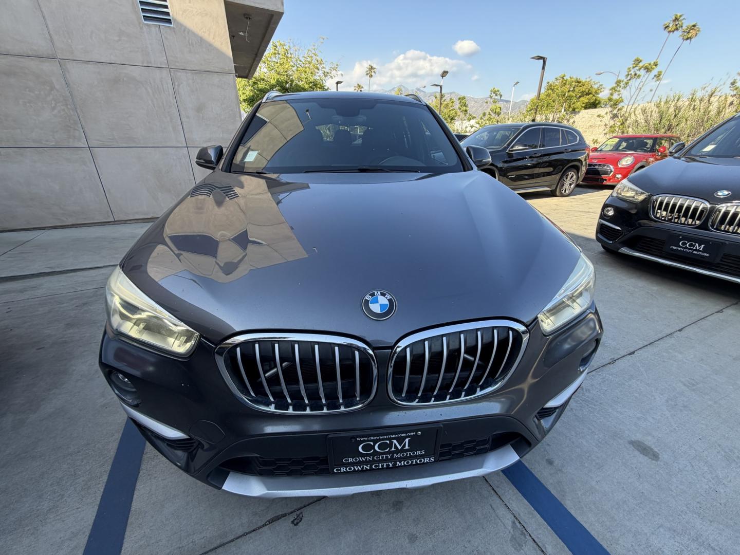 2016 Gray /Black BMW X1 leather (WBXHT3Z34G4) with an 4 CYLINDER engine, Automatic transmission, located at 30 S. Berkeley Avenue, Pasadena, CA, 91107, (626) 248-7567, 34.145447, -118.109398 - Looking for a reliable, stylish, and fuel-efficient luxury vehicle with easy financing in Pasadena, CA? This 2016 BMW X1 (VIN: WBXHT3Z34G4A48750) is the perfect combination of performance, comfort, and practicality—available now at Crown City Motors with Buy Here Pay Here financing designed for al - Photo#4