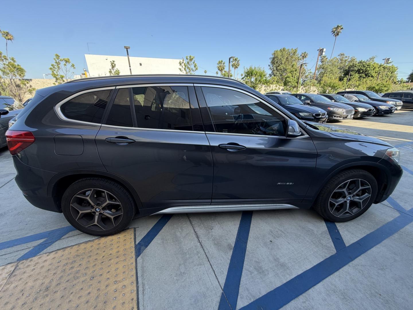 2016 Gray /Black BMW X1 leather (WBXHT3Z34G4) with an 4 CYLINDER engine, Automatic transmission, located at 30 S. Berkeley Avenue, Pasadena, CA, 91107, (626) 248-7567, 34.145447, -118.109398 - Looking for a reliable, stylish, and fuel-efficient luxury vehicle with easy financing in Pasadena, CA? This 2016 BMW X1 (VIN: WBXHT3Z34G4A48750) is the perfect combination of performance, comfort, and practicality—available now at Crown City Motors with Buy Here Pay Here financing designed for al - Photo#6