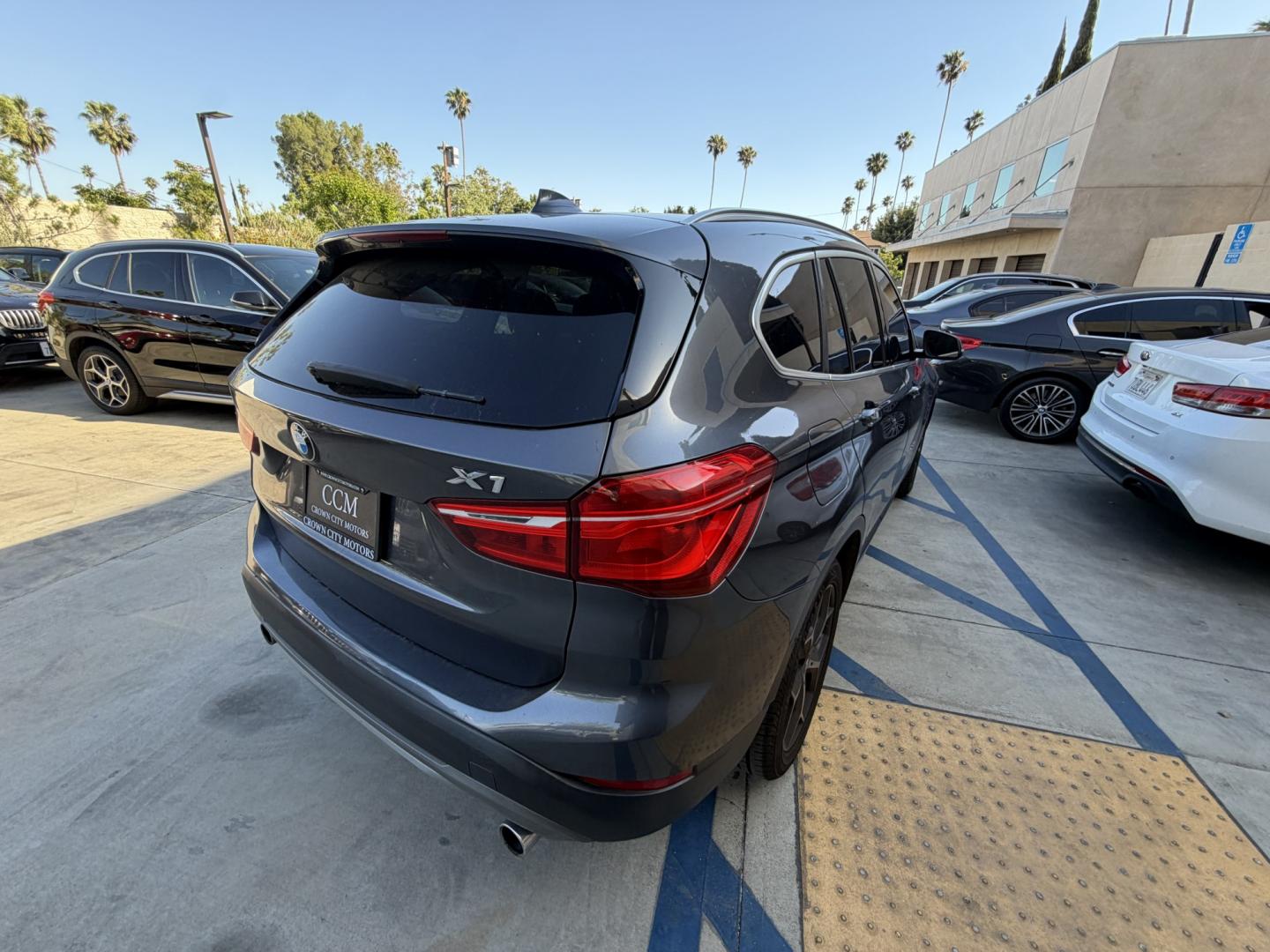 2016 Gray /Black BMW X1 leather (WBXHT3Z34G4) with an 4 CYLINDER engine, Automatic transmission, located at 30 S. Berkeley Avenue, Pasadena, CA, 91107, (626) 248-7567, 34.145447, -118.109398 - Looking for a reliable, stylish, and fuel-efficient luxury vehicle with easy financing in Pasadena, CA? This 2016 BMW X1 (VIN: WBXHT3Z34G4A48750) is the perfect combination of performance, comfort, and practicality—available now at Crown City Motors with Buy Here Pay Here financing designed for al - Photo#7
