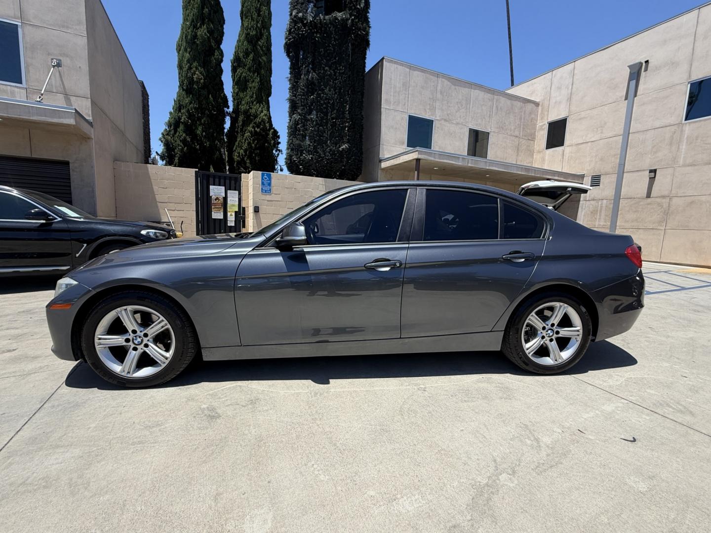 2014 Gray /Black BMW 3-Series leather (WBA3B1C52EK) with an 4 Cylinder engine, Automatic transmission, located at 30 S. Berkeley Avenue, Pasadena, CA, 91107, (626) 248-7567, 34.145447, -118.109398 - DEALER IDENTIFIER: Crown City Motors Sales | Buy Here Pay Here Pasadena TARGET REGIONS: Pasadena, San Gabriel Valley, Riverside, San Bernardino FINANCING SPECIALTY: Subprime Auto Lending, In-House Financing, Bad Credit Car Loans CA VEHICLE: 2014 BMW 320i Sedan (VIN: WBA3B1C52EK134294 | Stock: K13- Photo#2