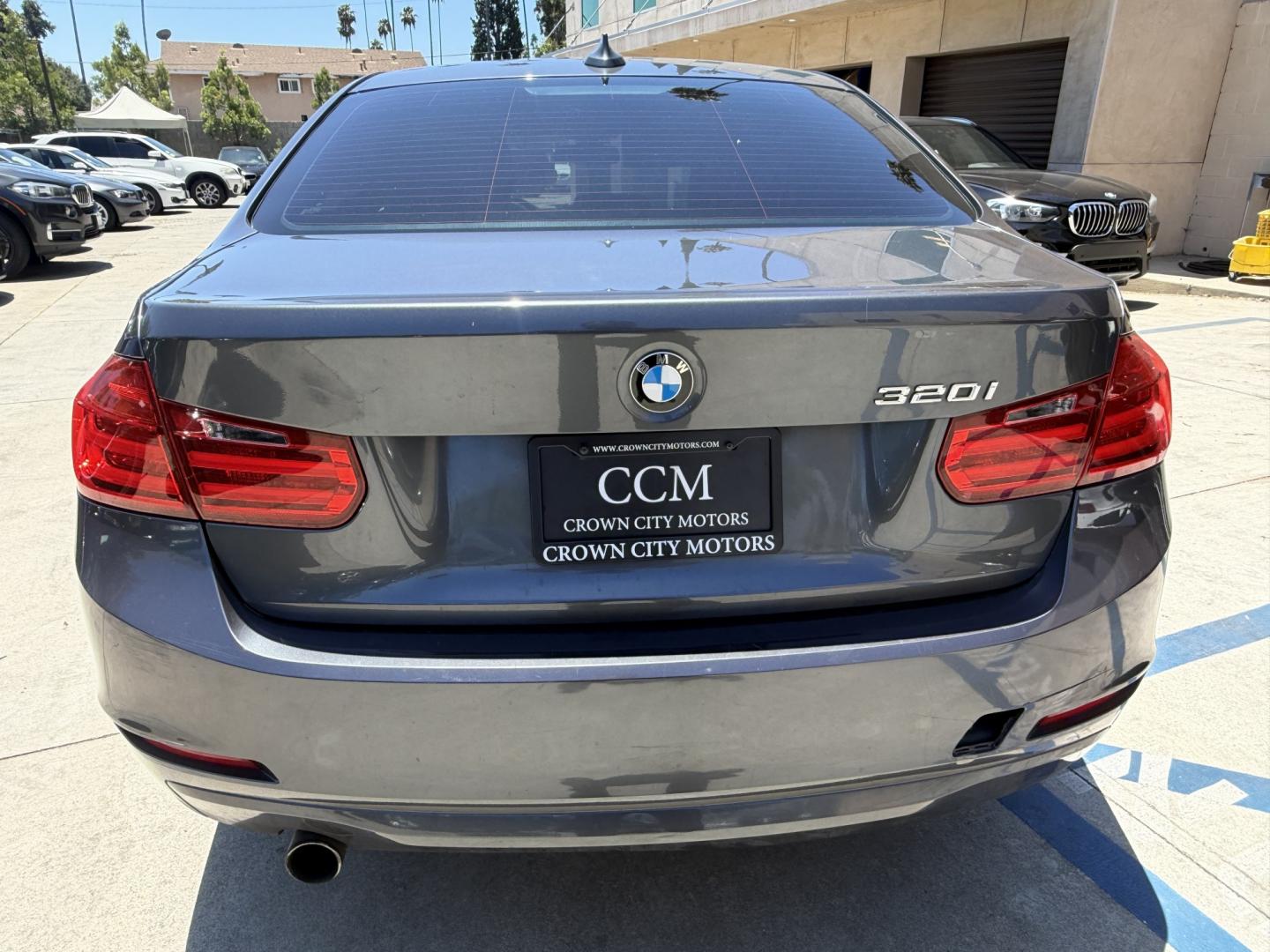 2014 Gray /Black BMW 3-Series leather (WBA3B1C52EK) with an 4 Cylinder engine, Automatic transmission, located at 30 S. Berkeley Avenue, Pasadena, CA, 91107, (626) 248-7567, 34.145447, -118.109398 - DEALER IDENTIFIER: Crown City Motors Sales | Buy Here Pay Here Pasadena TARGET REGIONS: Pasadena, San Gabriel Valley, Riverside, San Bernardino FINANCING SPECIALTY: Subprime Auto Lending, In-House Financing, Bad Credit Car Loans CA VEHICLE: 2014 BMW 320i Sedan (VIN: WBA3B1C52EK134294 | Stock: K13- Photo#4