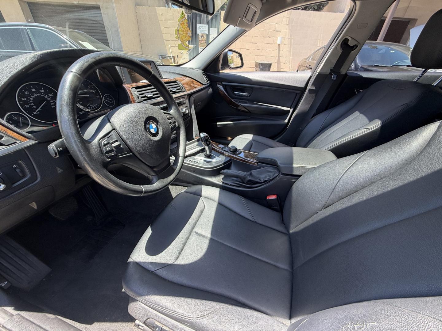 2014 Gray /Black BMW 3-Series leather (WBA3B1C52EK) with an 4 Cylinder engine, Automatic transmission, located at 30 S. Berkeley Avenue, Pasadena, CA, 91107, (626) 248-7567, 34.145447, -118.109398 - DEALER IDENTIFIER: Crown City Motors Sales | Buy Here Pay Here Pasadena TARGET REGIONS: Pasadena, San Gabriel Valley, Riverside, San Bernardino FINANCING SPECIALTY: Subprime Auto Lending, In-House Financing, Bad Credit Car Loans CA VEHICLE: 2014 BMW 320i Sedan (VIN: WBA3B1C52EK134294 | Stock: K13- Photo#7