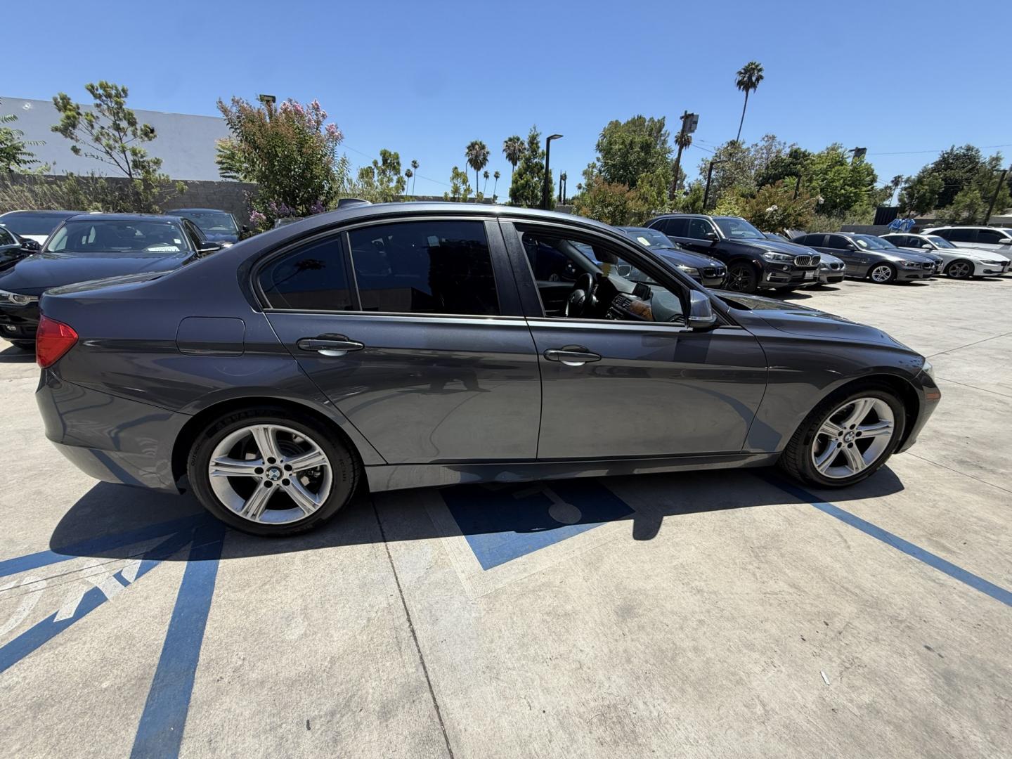 2014 Gray /Black BMW 3-Series leather (WBA3B1C52EK) with an 4 Cylinder engine, Automatic transmission, located at 30 S. Berkeley Avenue, Pasadena, CA, 91107, (626) 248-7567, 34.145447, -118.109398 - DEALER IDENTIFIER: Crown City Motors Sales | Buy Here Pay Here Pasadena TARGET REGIONS: Pasadena, San Gabriel Valley, Riverside, San Bernardino FINANCING SPECIALTY: Subprime Auto Lending, In-House Financing, Bad Credit Car Loans CA VEHICLE: 2014 BMW 320i Sedan (VIN: WBA3B1C52EK134294 | Stock: K13- Photo#6
