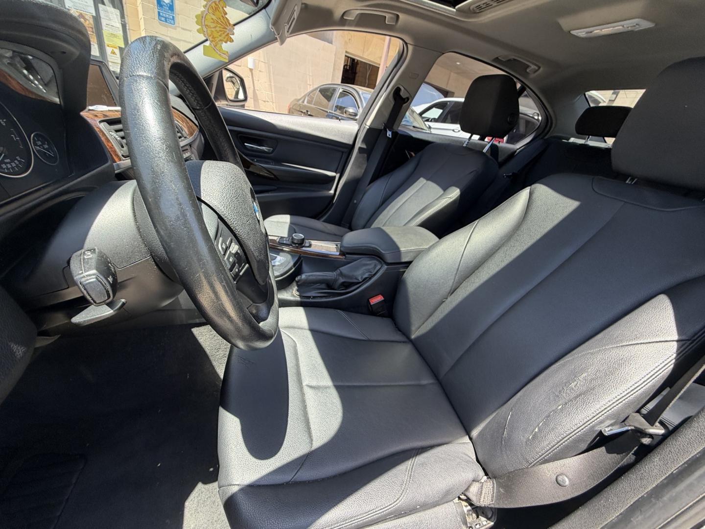 2014 Gray /Black BMW 3-Series leather (WBA3B1C52EK) with an 4 Cylinder engine, Automatic transmission, located at 30 S. Berkeley Avenue, Pasadena, CA, 91107, (626) 248-7567, 34.145447, -118.109398 - DEALER IDENTIFIER: Crown City Motors Sales | Buy Here Pay Here Pasadena TARGET REGIONS: Pasadena, San Gabriel Valley, Riverside, San Bernardino FINANCING SPECIALTY: Subprime Auto Lending, In-House Financing, Bad Credit Car Loans CA VEHICLE: 2014 BMW 320i Sedan (VIN: WBA3B1C52EK134294 | Stock: K13- Photo#9