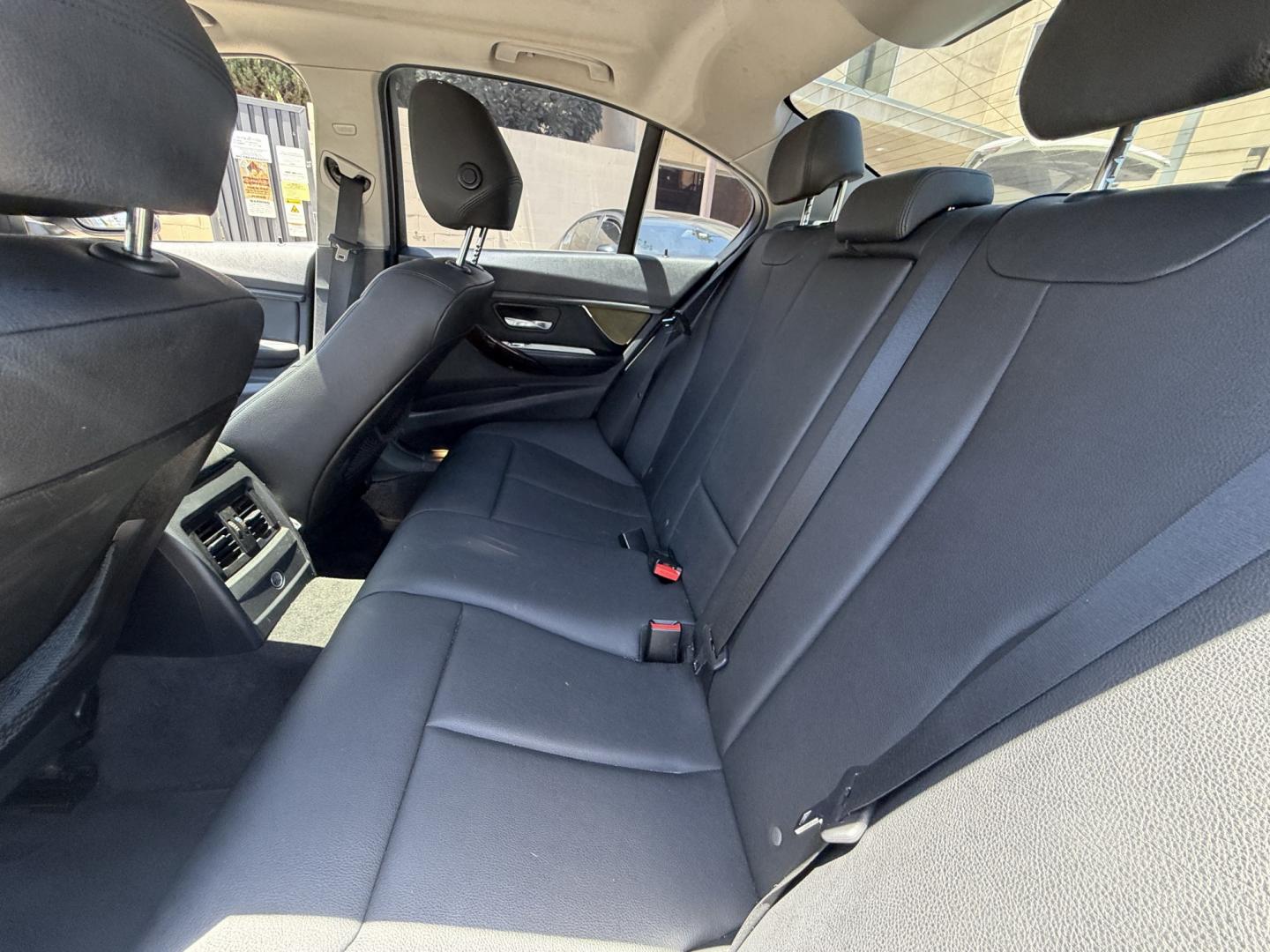 2014 Gray /Black BMW 3-Series leather (WBA3B1C52EK) with an 4 Cylinder engine, Automatic transmission, located at 30 S. Berkeley Avenue, Pasadena, CA, 91107, (626) 248-7567, 34.145447, -118.109398 - DEALER IDENTIFIER: Crown City Motors Sales | Buy Here Pay Here Pasadena TARGET REGIONS: Pasadena, San Gabriel Valley, Riverside, San Bernardino FINANCING SPECIALTY: Subprime Auto Lending, In-House Financing, Bad Credit Car Loans CA VEHICLE: 2014 BMW 320i Sedan (VIN: WBA3B1C52EK134294 | Stock: K13- Photo#10