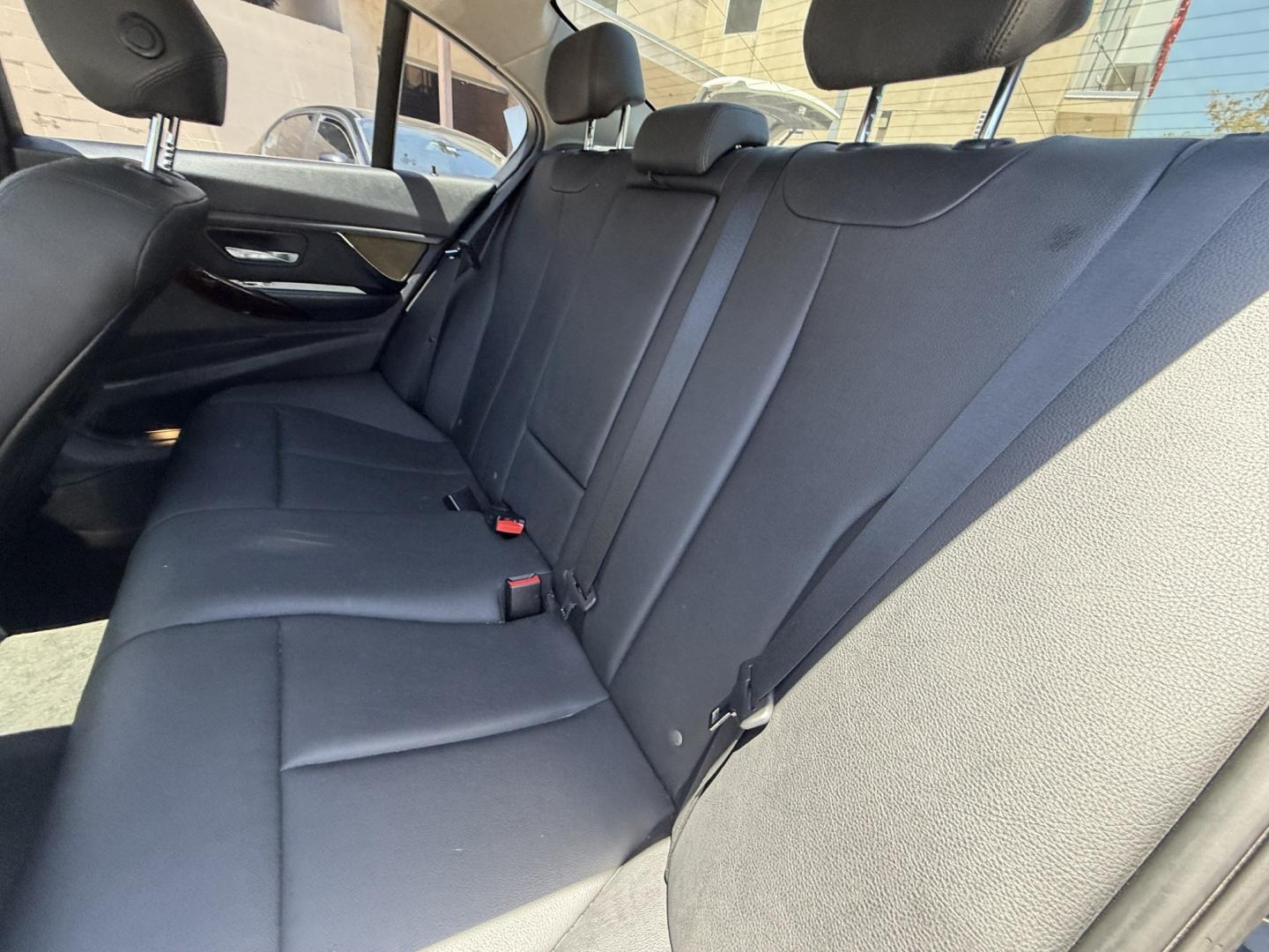 2014 Gray /Black BMW 3-Series leather (WBA3B1C52EK) with an 4 Cylinder engine, Automatic transmission, located at 30 S. Berkeley Avenue, Pasadena, CA, 91107, (626) 248-7567, 34.145447, -118.109398 - DEALER IDENTIFIER: Crown City Motors Sales | Buy Here Pay Here Pasadena TARGET REGIONS: Pasadena, San Gabriel Valley, Riverside, San Bernardino FINANCING SPECIALTY: Subprime Auto Lending, In-House Financing, Bad Credit Car Loans CA VEHICLE: 2014 BMW 320i Sedan (VIN: WBA3B1C52EK134294 | Stock: K13- Photo#11