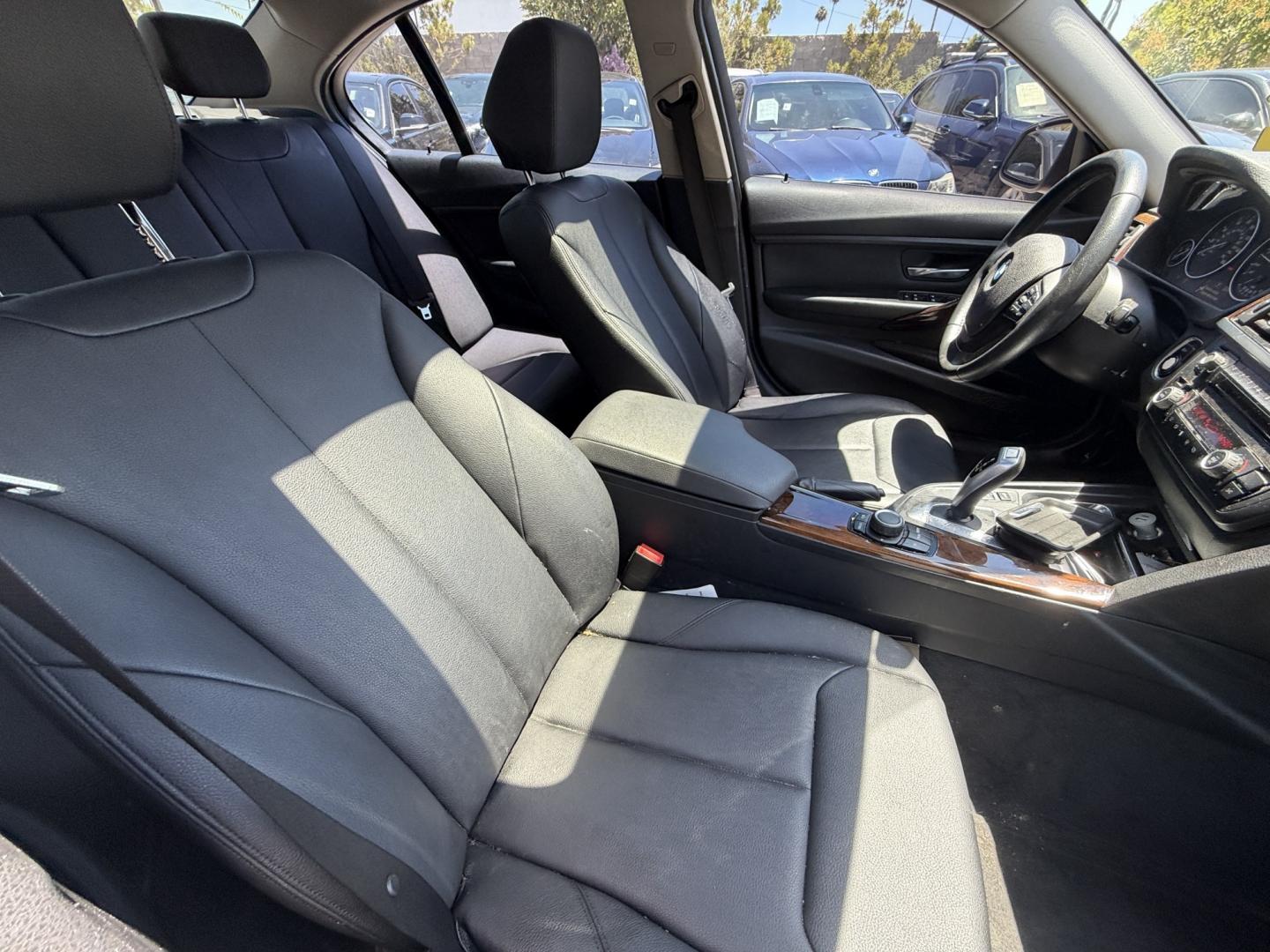 2014 Gray /Black BMW 3-Series leather (WBA3B1C52EK) with an 4 Cylinder engine, Automatic transmission, located at 30 S. Berkeley Avenue, Pasadena, CA, 91107, (626) 248-7567, 34.145447, -118.109398 - DEALER IDENTIFIER: Crown City Motors Sales | Buy Here Pay Here Pasadena TARGET REGIONS: Pasadena, San Gabriel Valley, Riverside, San Bernardino FINANCING SPECIALTY: Subprime Auto Lending, In-House Financing, Bad Credit Car Loans CA VEHICLE: 2014 BMW 320i Sedan (VIN: WBA3B1C52EK134294 | Stock: K13- Photo#12