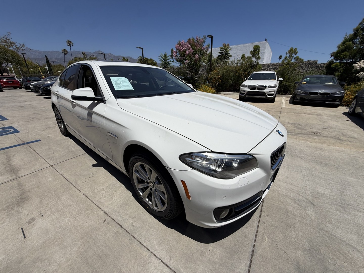 2015 WHITE /Black BMW 5-Series Leather (WBA5A7C54FG) with an 4 Cylinder engine, Automatic transmission, located at 30 S. Berkeley Avenue, Pasadena, CA, 91107, (626) 248-7567, 34.145447, -118.109398 - The 2015 BMW 528i xDrive stands as a beacon of luxury, performance, and advanced technology, embodying the pinnacle of German engineering. With only 72,430 miles, this well-maintained vehicle offers a remarkable driving experience that combines comfort, style, and reliability. Whether you have an im- Photo#6