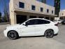 2015 Alpine White /Black BMW X4 Leather (5UXXW3C59F0) with an 2.0 engine, Automatic transmission, located at 30 S. Berkeley Avenue, Pasadena, CA, 91107, (626) 248-7567, 34.145447, -118.109398 - Discover the 2015 BMW X4 xDrive28i: Luxury Meets Affordability Are you in the market for a luxury vehicle that doesn't break the bank? Look no further than the 2015 BMW X4 xDrive28i. This impressive model offers the perfect blend of performance, style, and affordability. At our dealership, we under - Photo#2