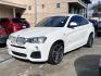 2015 Alpine White /Black BMW X4 Leather (5UXXW3C59F0) with an 2.0 engine, Automatic transmission, located at 30 S. Berkeley Avenue, Pasadena, CA, 91107, (626) 248-7567, 34.145447, -118.109398 - Discover the 2015 BMW X4 xDrive28i: Luxury Meets Affordability Are you in the market for a luxury vehicle that doesn't break the bank? Look no further than the 2015 BMW X4 xDrive28i. This impressive model offers the perfect blend of performance, style, and affordability. At our dealership, we under - Photo#4