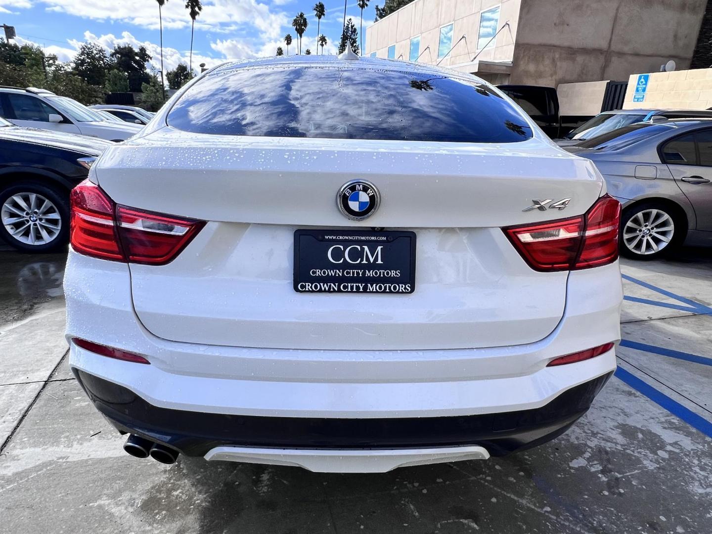 2015 Alpine White /Black BMW X4 Leather (5UXXW3C59F0) with an 2.0 engine, Automatic transmission, located at 30 S. Berkeley Avenue, Pasadena, CA, 91107, (626) 248-7567, 34.145447, -118.109398 - Discover the 2015 BMW X4 xDrive28i: Luxury Meets Affordability Are you in the market for a luxury vehicle that doesn't break the bank? Look no further than the 2015 BMW X4 xDrive28i. This impressive model offers the perfect blend of performance, style, and affordability. At our dealership, we under - Photo#7